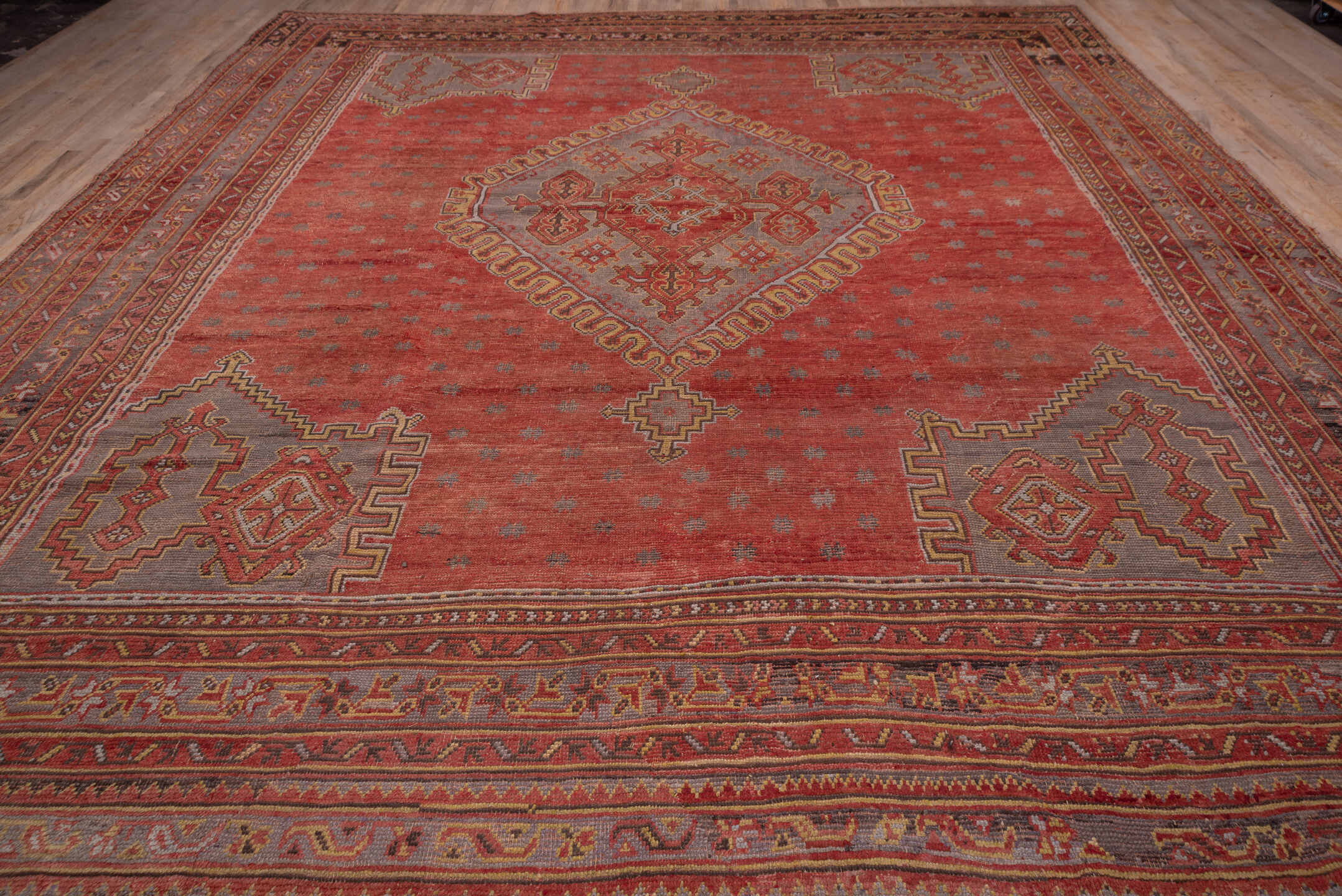 13' x 15' one-of-a-kind handmade vintage Oushak oversize rug. Color palette: terra cotta, rust, taupe, rose, burgundy, gold