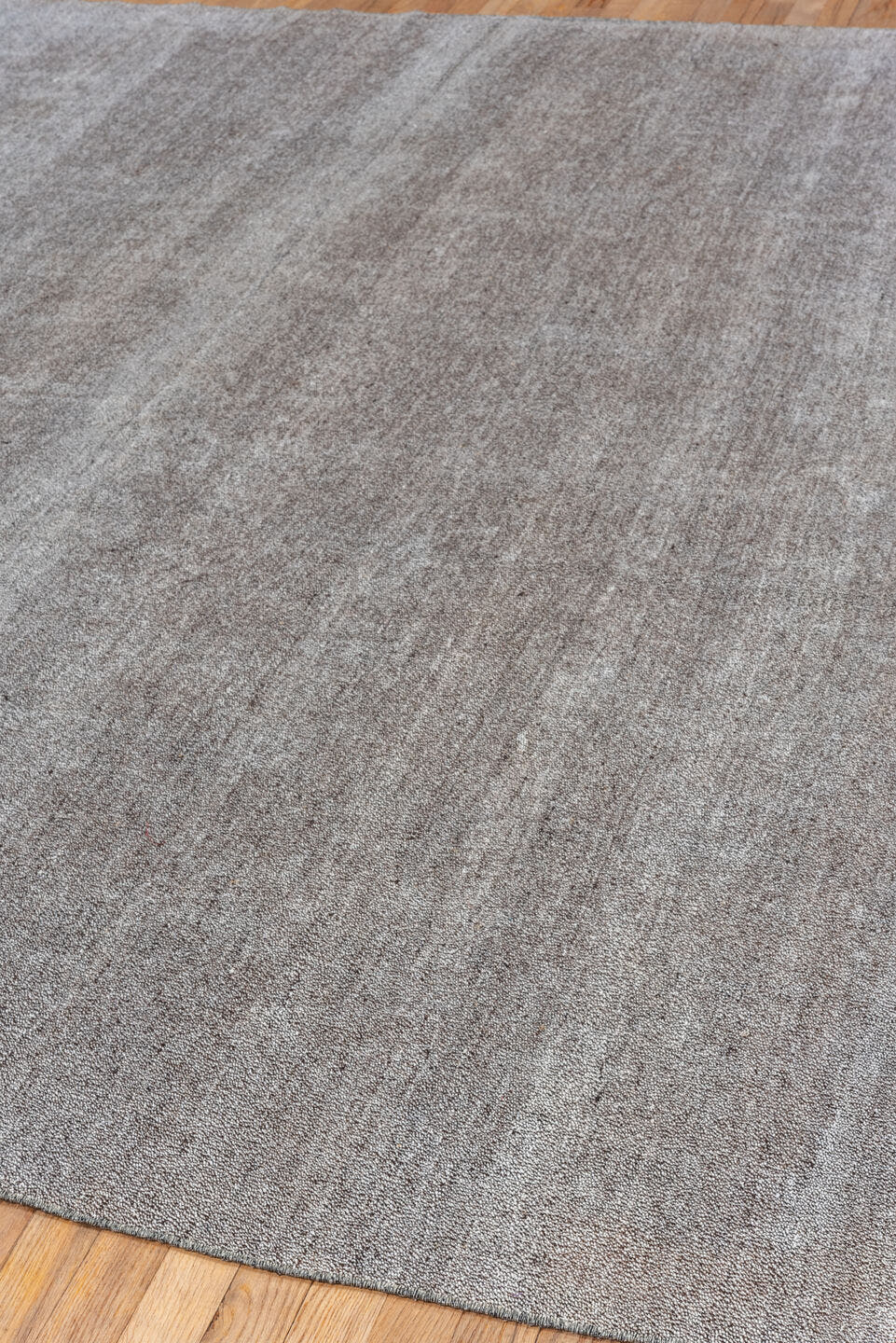 7' x 9' one-of-a-kind handmade antique Flatweave rug. Color palette: gray, charcoal, taupe, black, beige