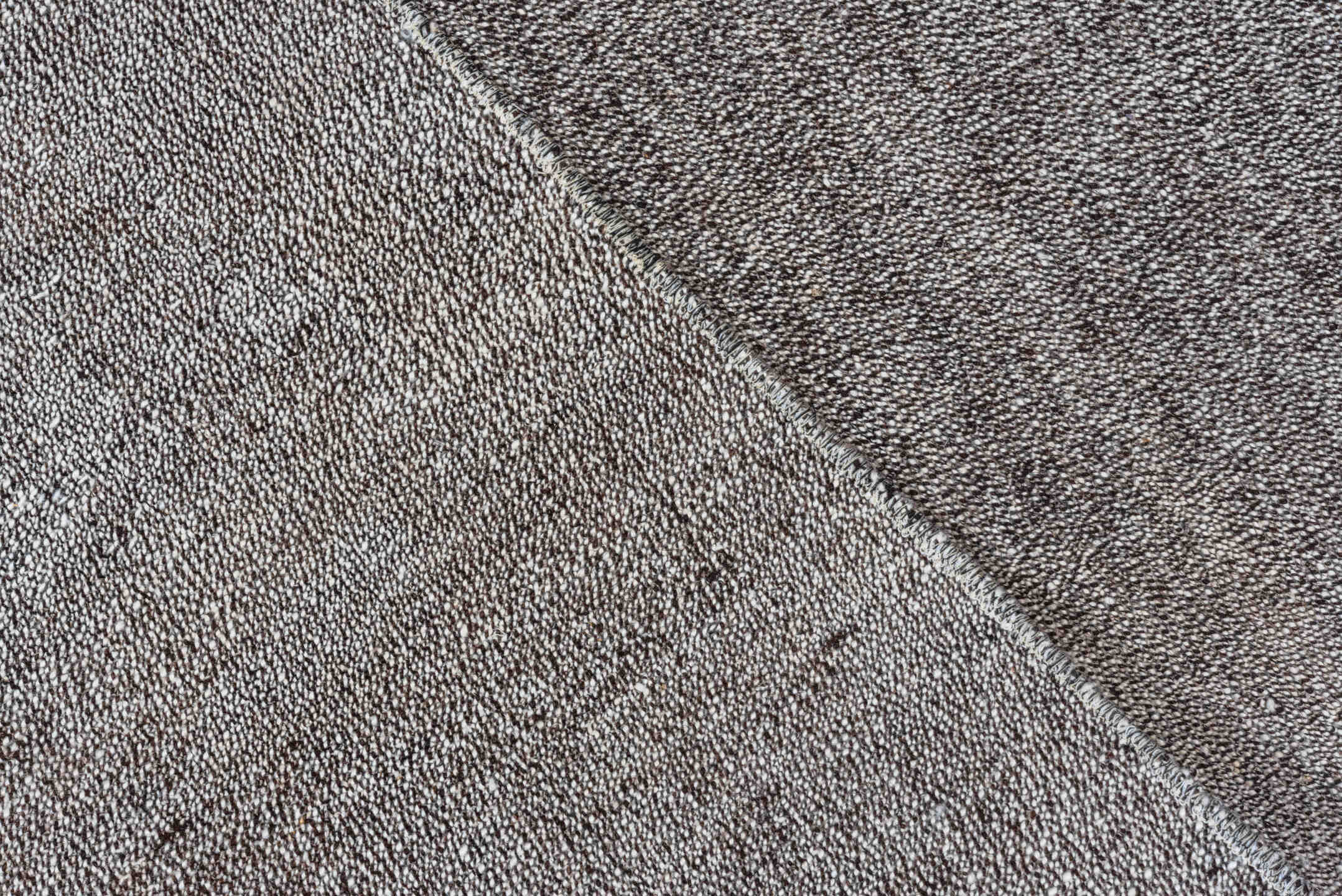 7' x 9' one-of-a-kind handmade antique Flatweave rug. Color palette: gray, charcoal, taupe, black, beige
