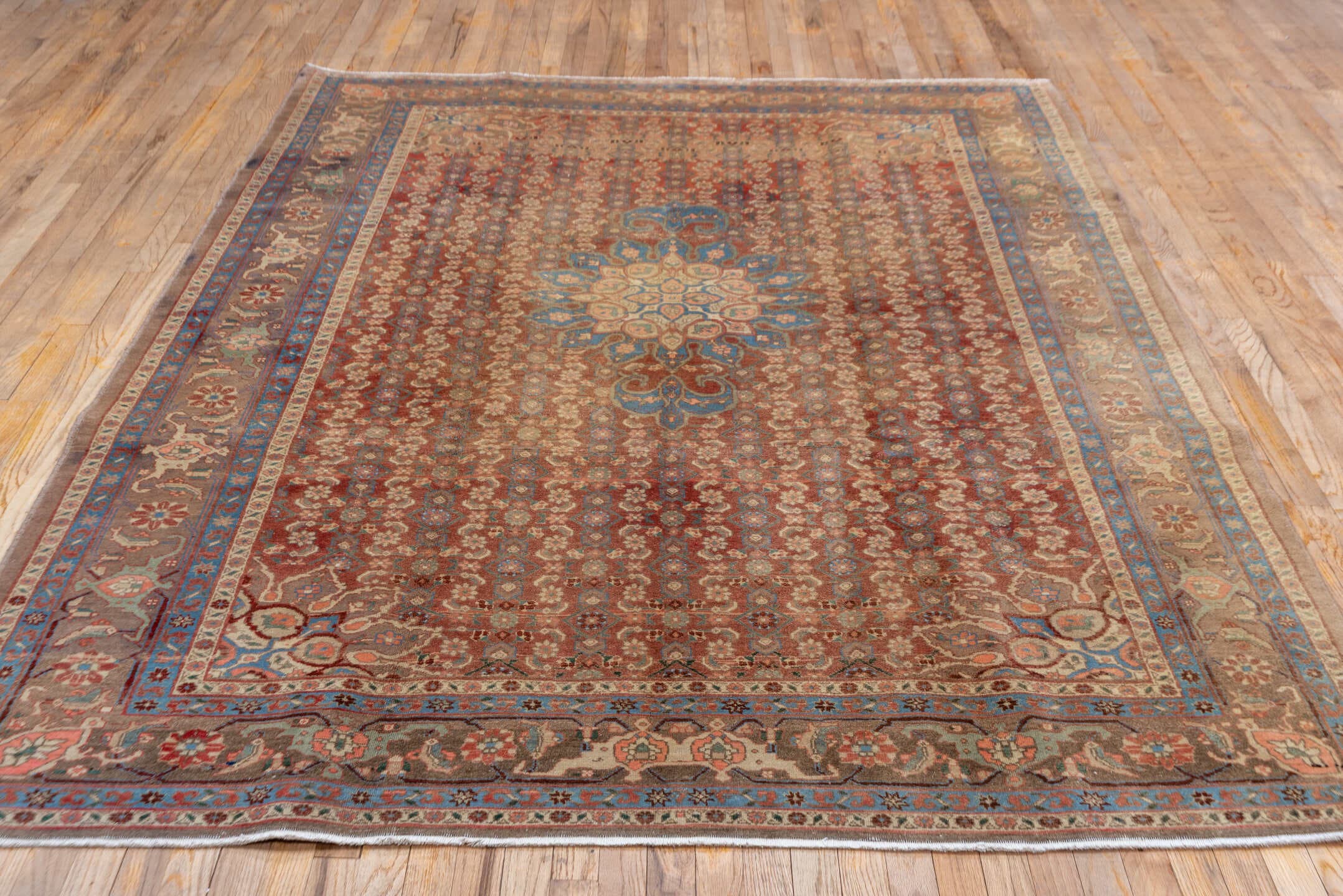 6' x 9' one-of-a-kind handmade vintage Bidjar medium size rug. Color palette: rust, taupe, slate blue, camel, ivory, brown