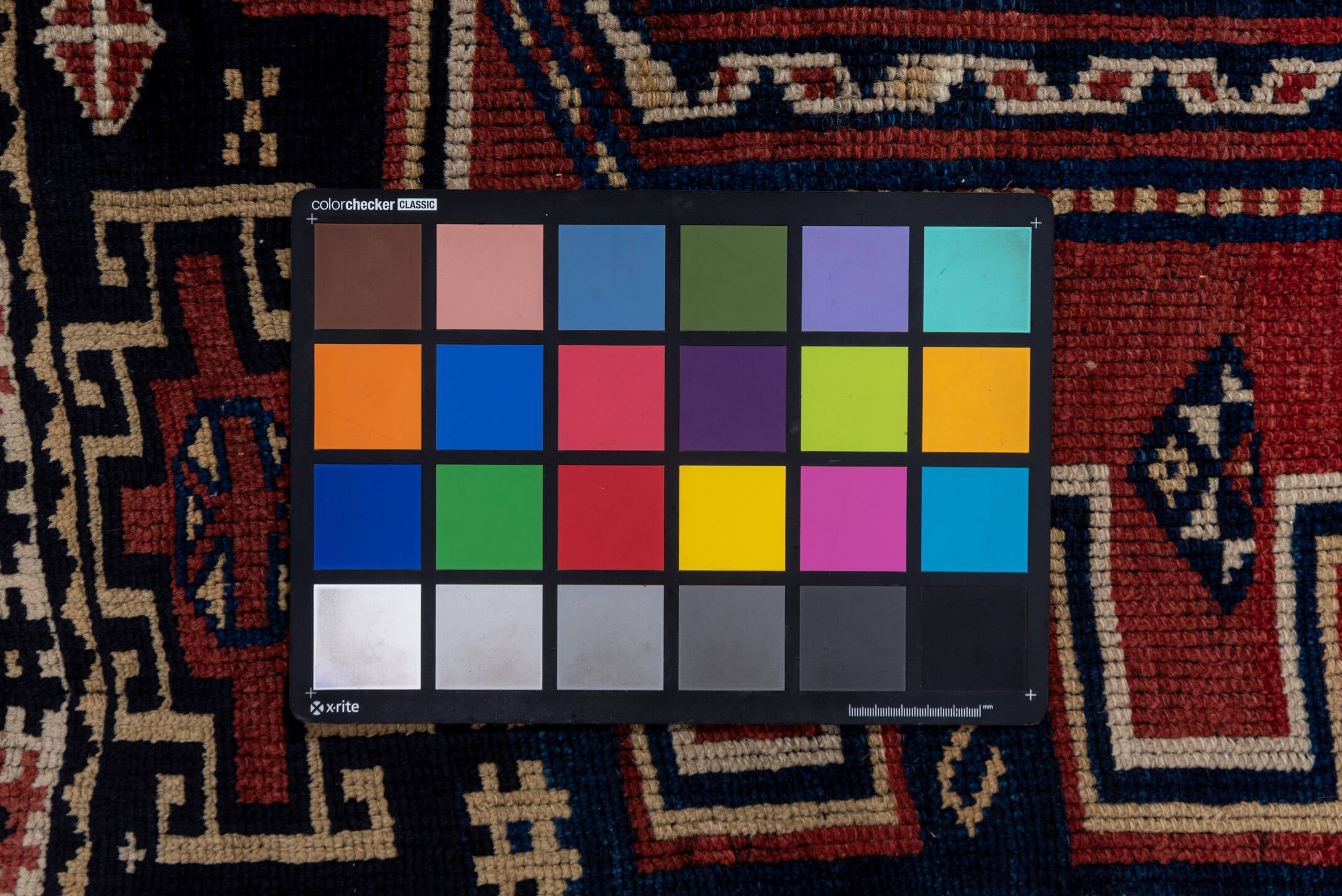 4' x 6' one-of-a-kind handmade vintage Trans Caucasian small size rug. Color palette: black, brown, gray, pink, red, wine