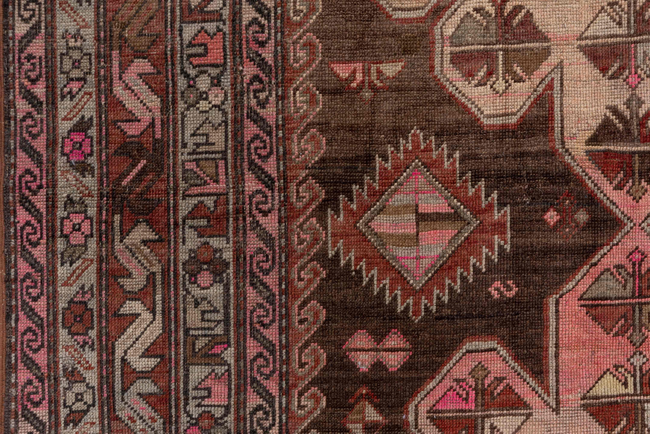 4' x 12' one-of-a-kind handmade vintage Trans Caucasian runner rug. Color palette: brown, gray, pink, redwood