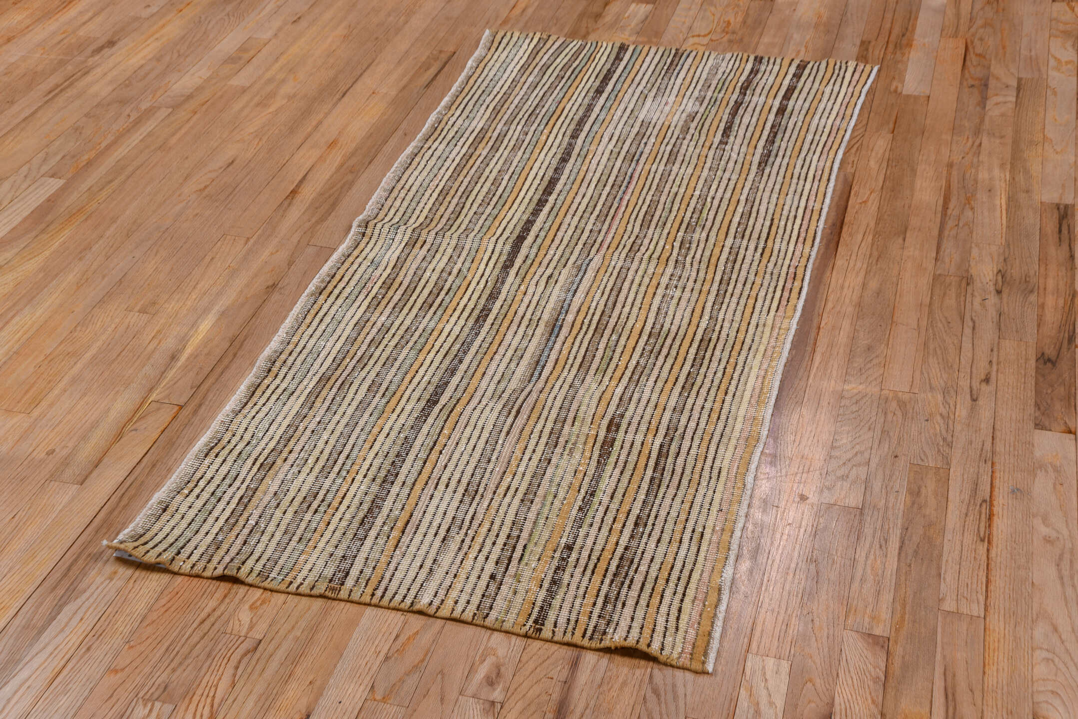 2' x 6' one-of-a-kind handmade vintage Tulu runner rug. Color palette: brown, gray, light gray, off-white, orange, snow