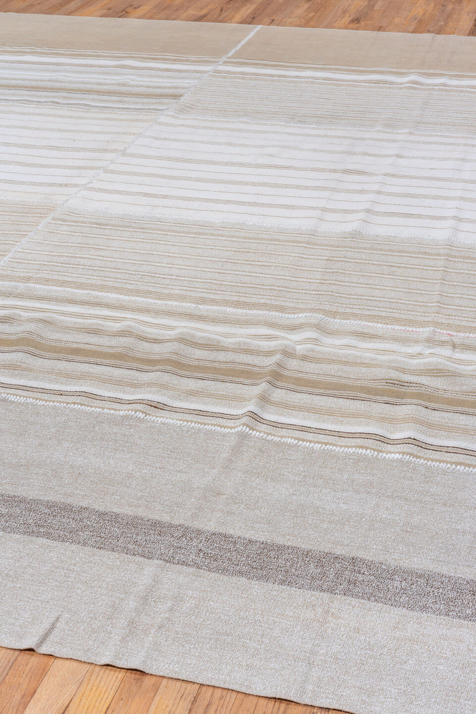 11' x 12' one-of-a-kind handmade antique Flatweave oversize rug. Color palette: ivory, beige, taupe, light brown, cream