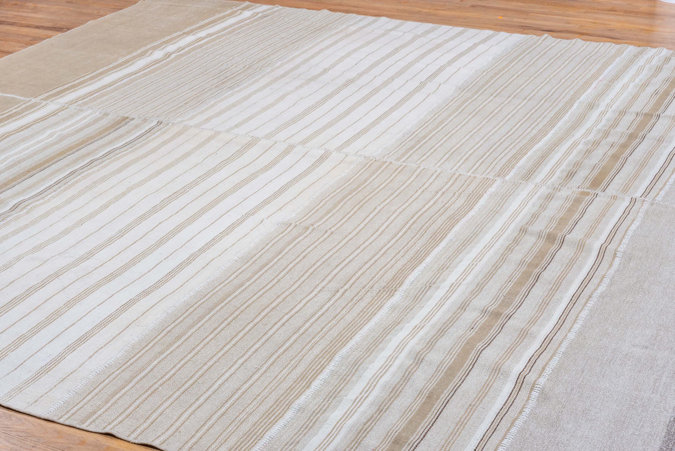 11' x 12' one-of-a-kind handmade antique Flatweave oversize rug. Color palette: ivory, beige, taupe, light brown, cream