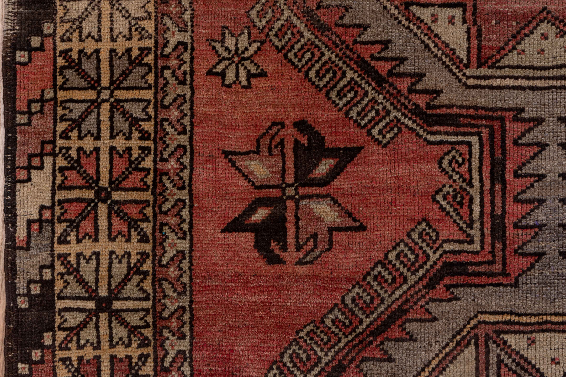 4' x 10' one-of-a-kind handmade vintage Oushak runner rug. Color palette: brown, gray, pink, red, redwood