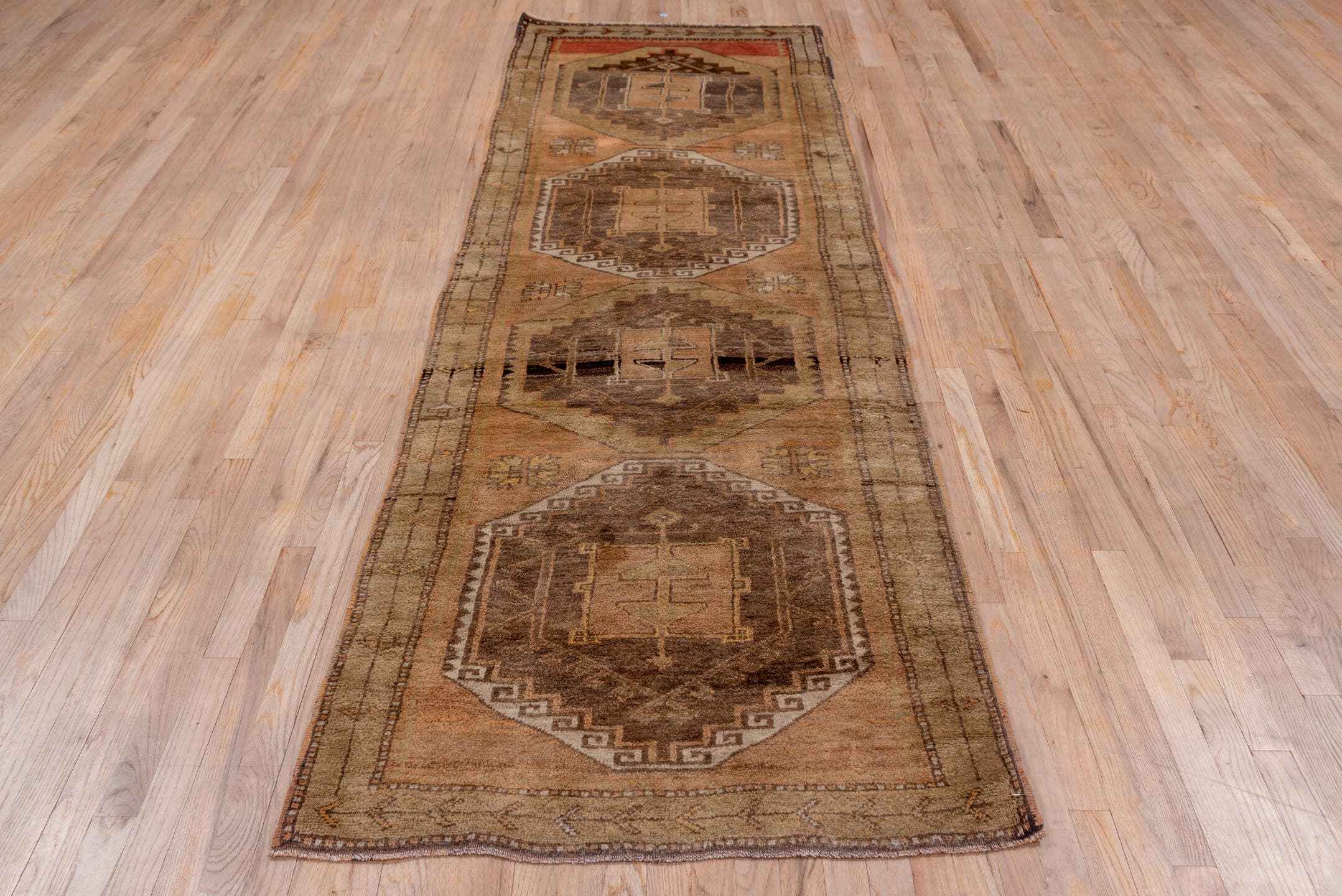 3' x 10' one-of-a-kind handmade vintage Oushak runner rug. Color palette: camel, taupe, brown, rust, ivory, tan, charcoal