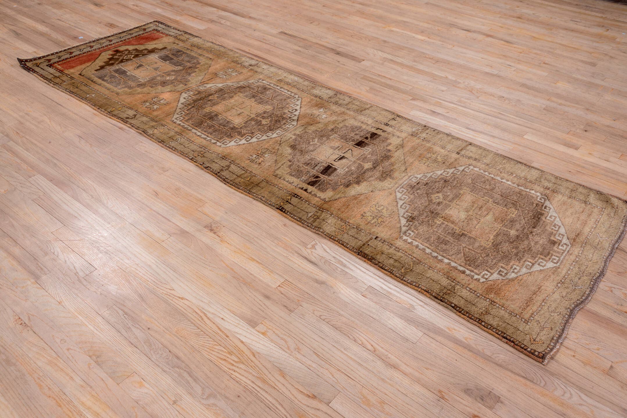 3' x 10' one-of-a-kind handmade vintage Oushak runner rug. Color palette: camel, taupe, brown, rust, ivory, tan, charcoal