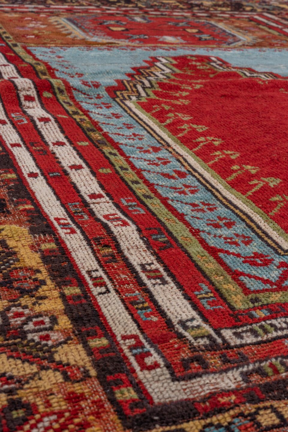9' x 12' one-of-a-kind handmade vintage Oushak large size rug. Color palette: crimson, sky blue, ivory, camel, charcoal
