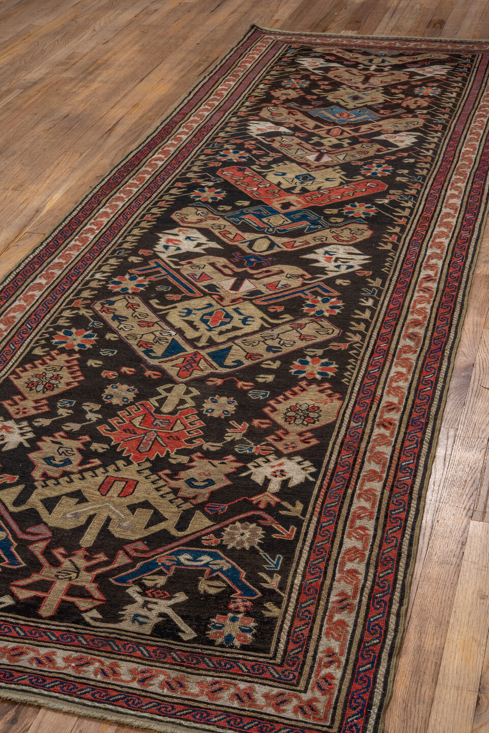 13' x 16' one-of-a-kind handmade vintage Afghan oversize rug. Color palette: dark brown, ivory, rust, blue, camel