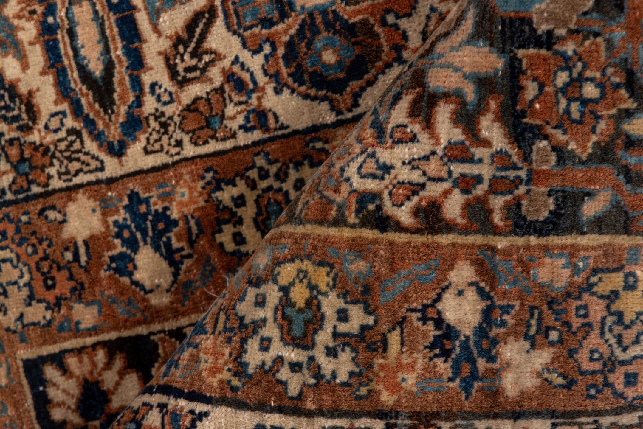 2' x 3' one-of-a-kind handmade vintage Tabriz small size rug. Color palette: camel, ivory, navy, brown, rust, sky_blue