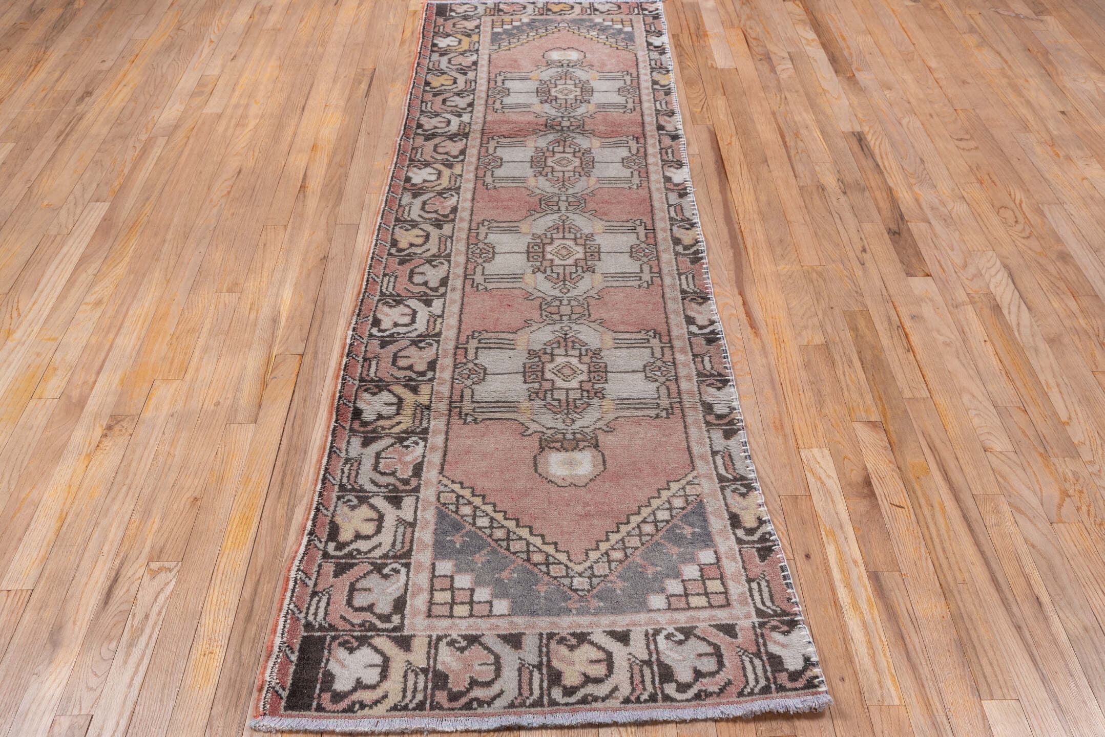 2' x 9' one-of-a-kind handmade vintage Oushak runner rug. Color palette: rose, ivory, charcoal, taupe, dusty blue, camel