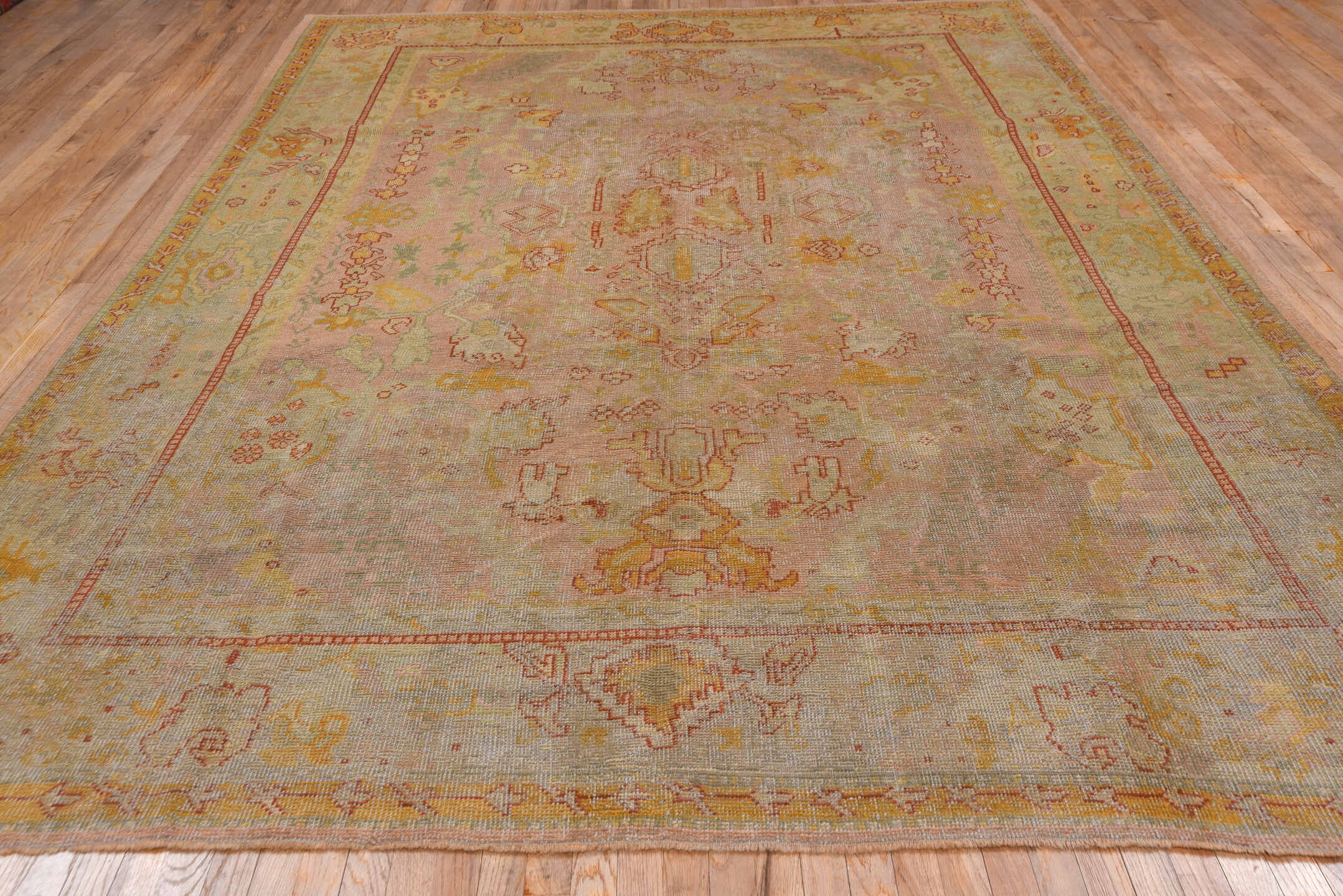 8' x 11' one-of-a-kind handmade antique Oushak large size rug. Color palette: blush, ivory, pale gold, terra cotta, sage