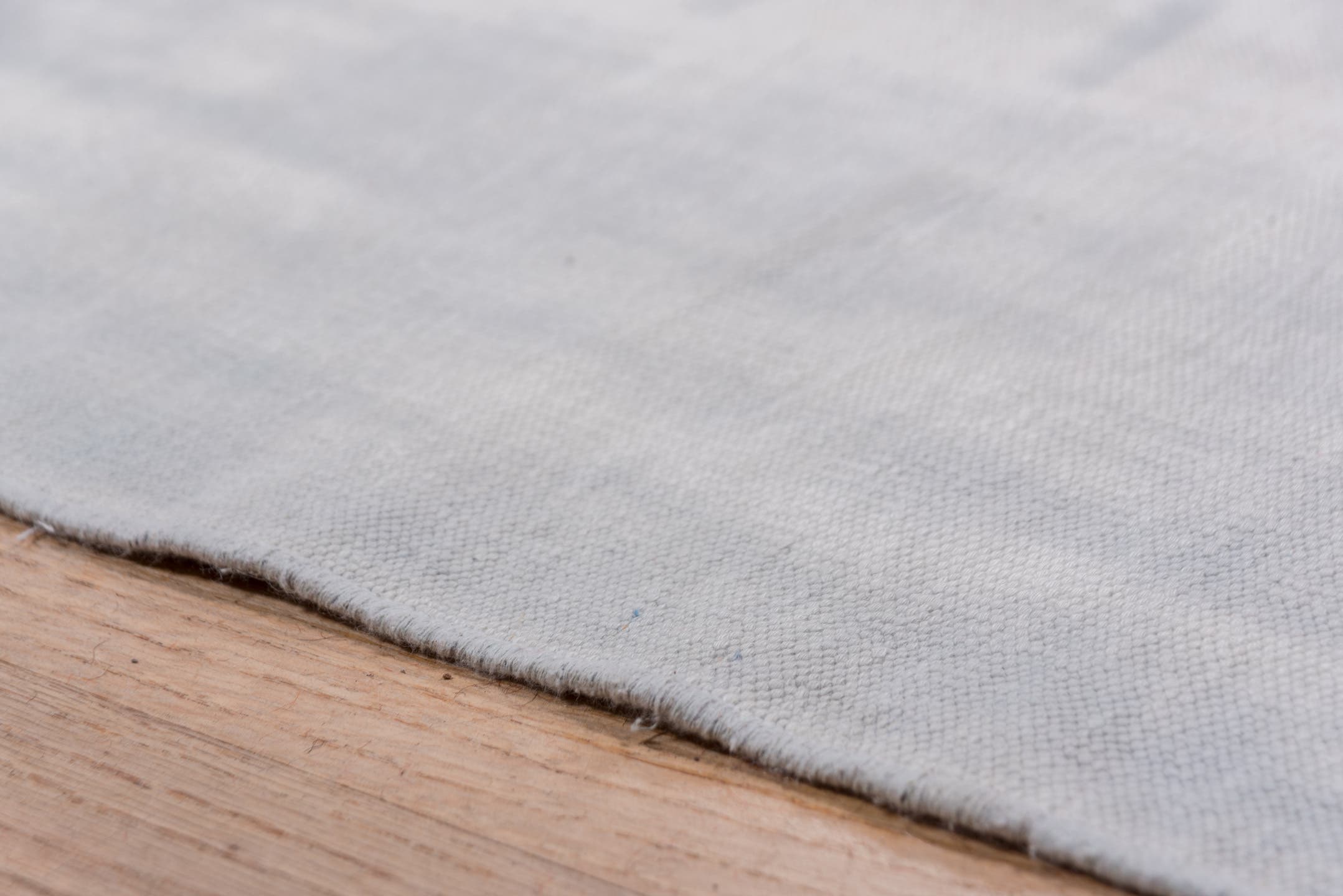 9' x 17' one-of-a-kind handmade antique Dhurrie rug. Color palette: pale blue, ivory, sky blue, light blue
