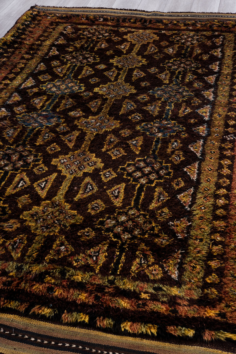 5' x 8' one-of-a-kind handmade antique Ouzbek medium size rug. Color palette: brown, camel, rust, charcoal, taupe, slate