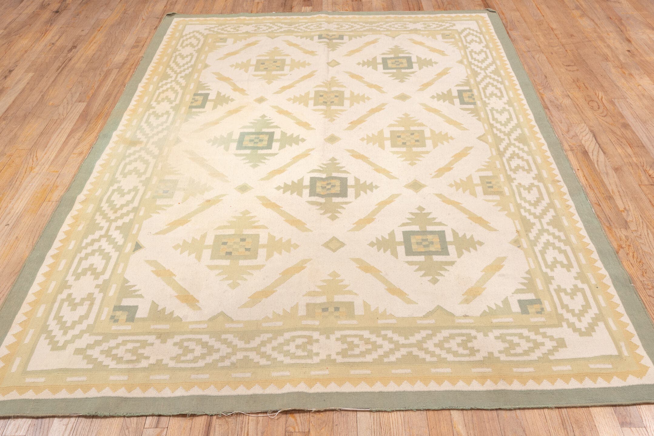 6' x 9' one-of-a-kind handmade antique Dhurrie medium size rug. Color palette: ivory, taupe, sage, sand, cream, beige, gray