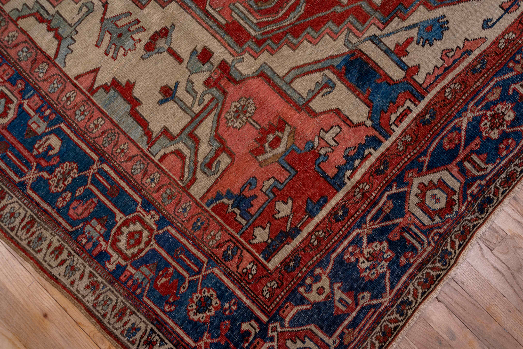 9' x 12' one-of-a-kind handmade vintage Serapi large size rug. Color palette: black, blue, brown, gray, pink, red