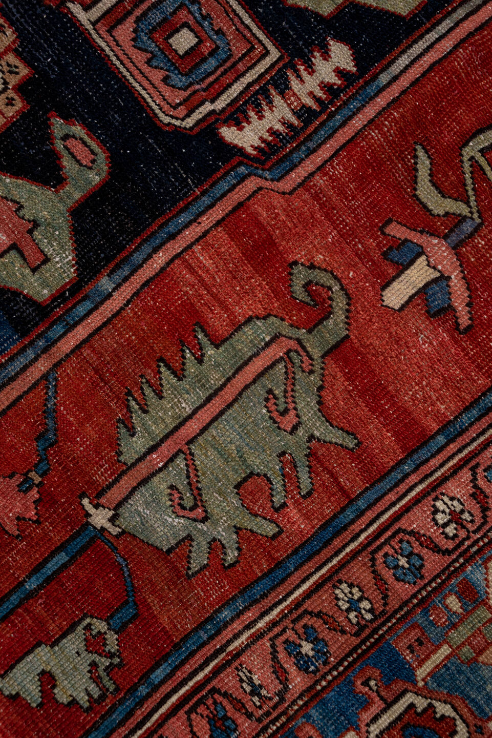 9' x 12' one-of-a-kind handmade vintage Serapi large size rug. Color palette: black, blue, brown, gray, pink, red