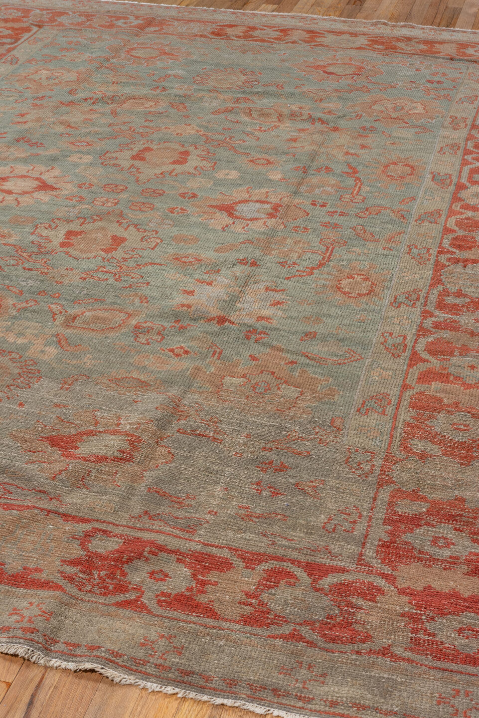 7' x 9' one-of-a-kind handmade antique Oushak rug. Color palette: sage, terra cotta, ivory, taupe, rose, beige, green