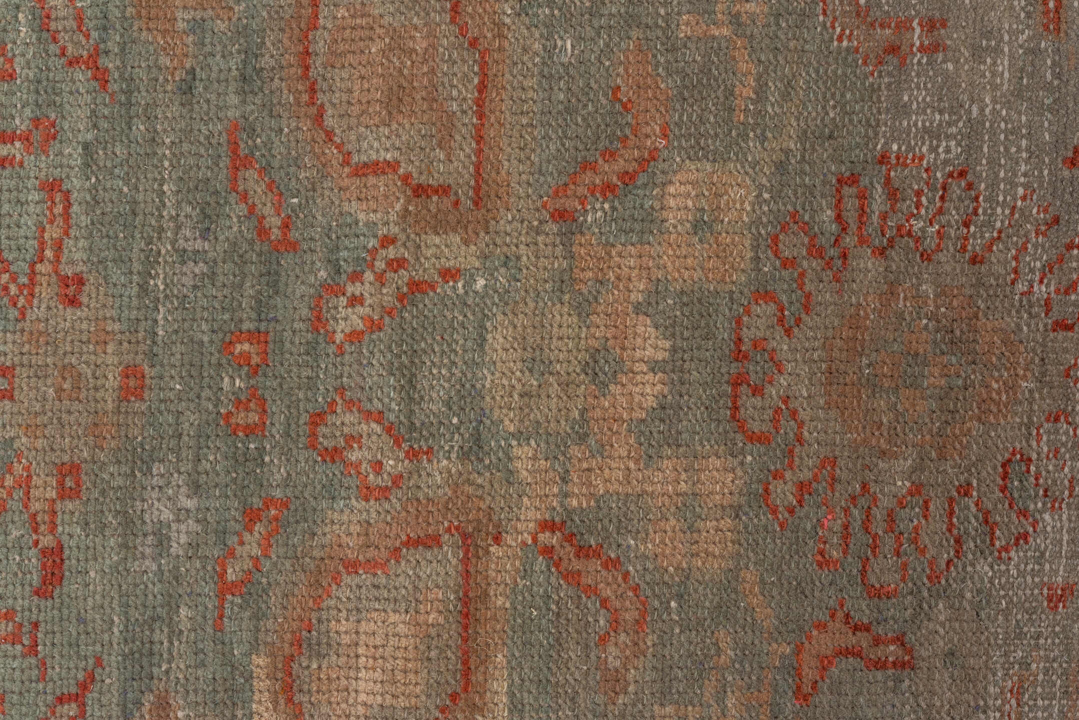 7' x 9' one-of-a-kind handmade antique Oushak rug. Color palette: sage, terra cotta, ivory, taupe, rose, beige, green