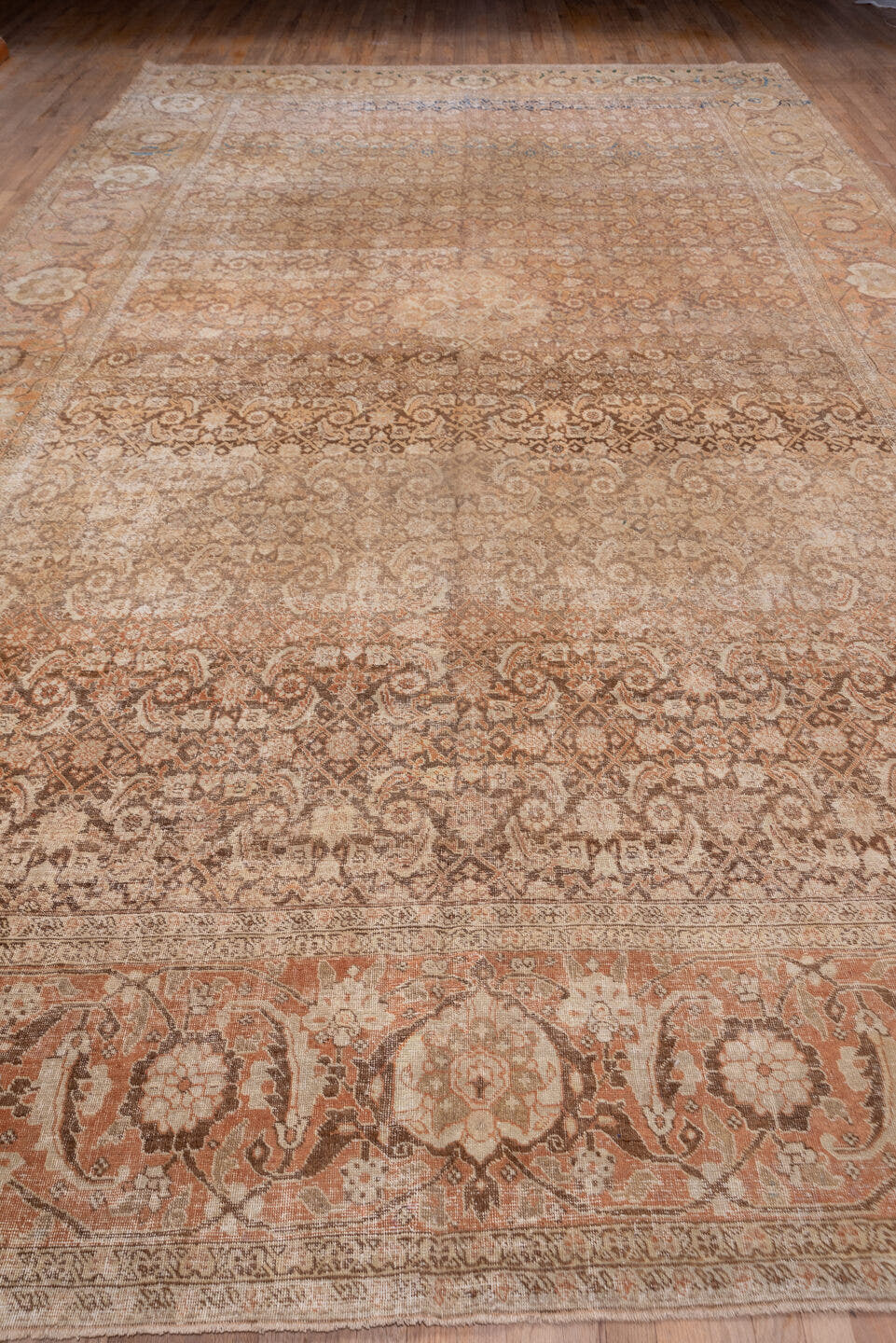 10' x 18' one-of-a-kind handmade antique Tabriz rug. Color palette: camel, taupe, ivory, tan, terra cotta, brown, pale blue