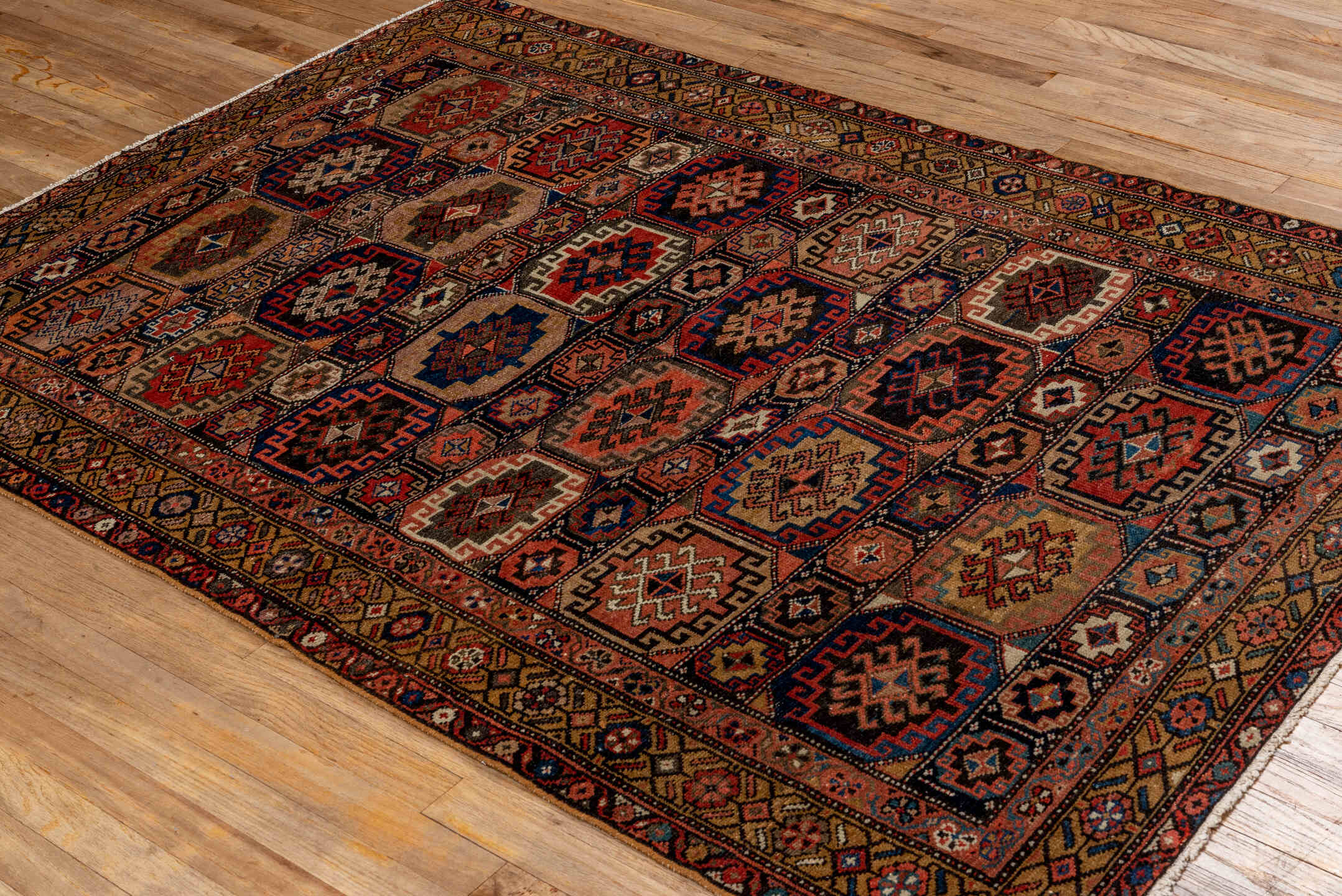4' x 6' one-of-a-kind handmade antique Malayer small size rug. Color palette: camel, navy, rust, terracotta, ivory, brown