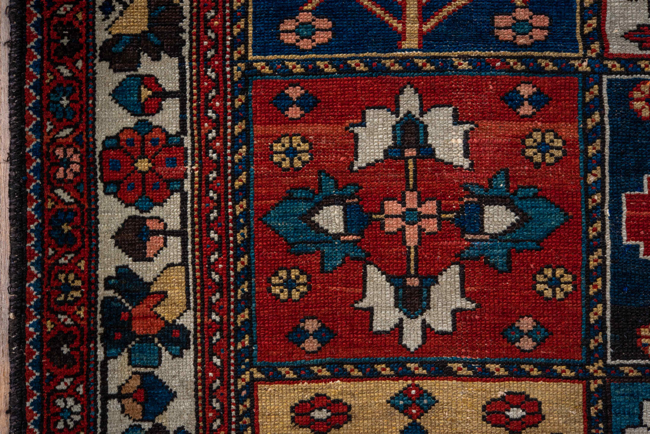 4' x 6' one-of-a-kind handmade antique Baktiary small size rug. Color palette: ivory, red, navy, sky_blue, rust, charcoal