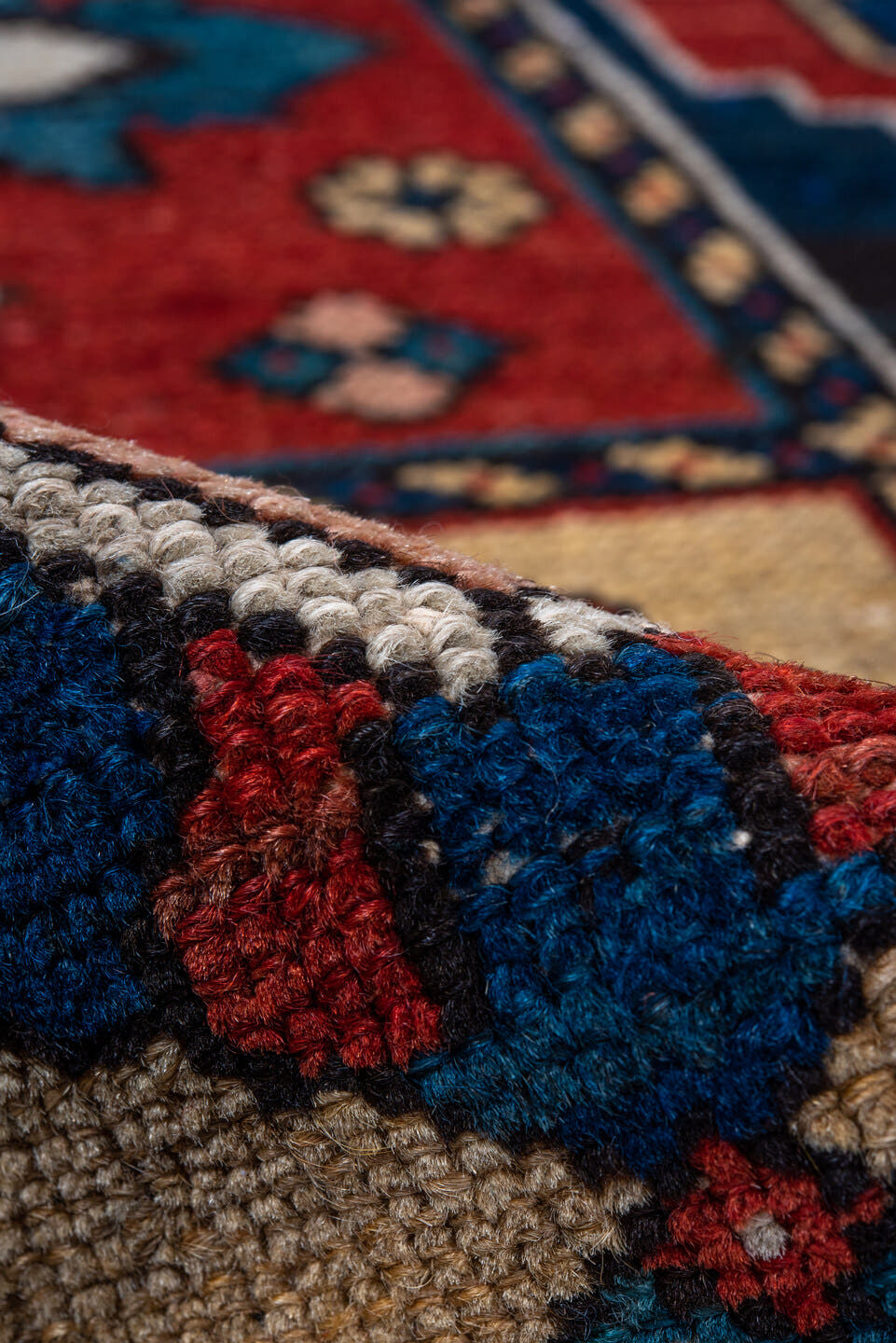 4' x 6' one-of-a-kind handmade antique Baktiary small size rug. Color palette: ivory, red, navy, sky_blue, rust, charcoal