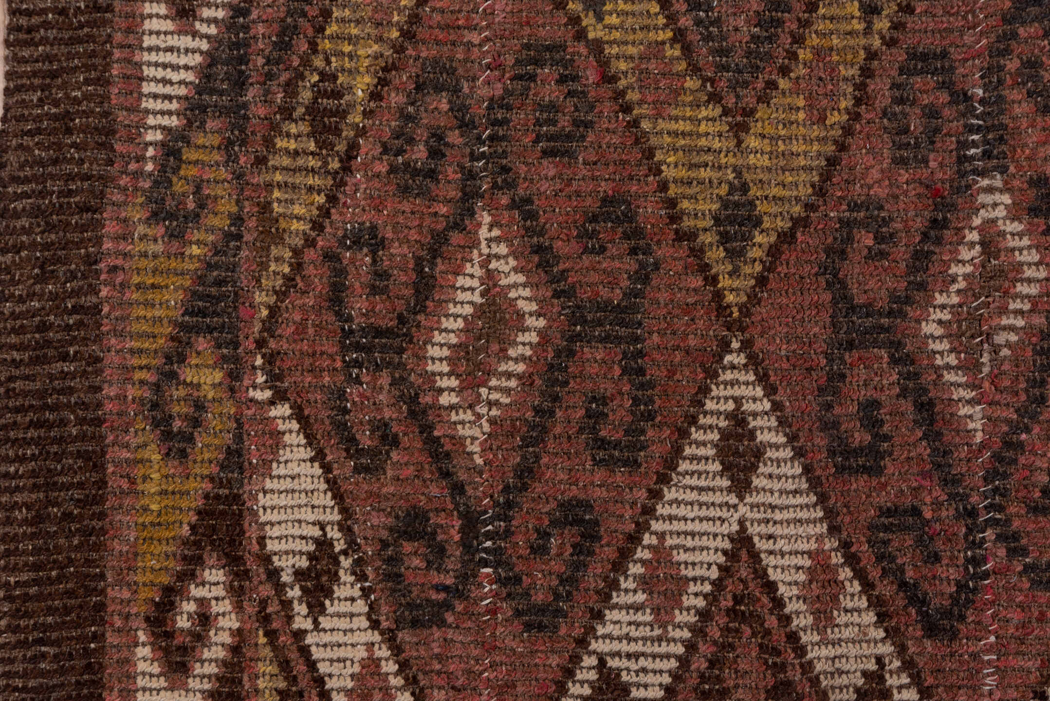 4' x 12' one-of-a-kind handmade antique Ouzbek runner rug. Color palette: rose, brown, ivory, ochre, mahogany, taupe, pink