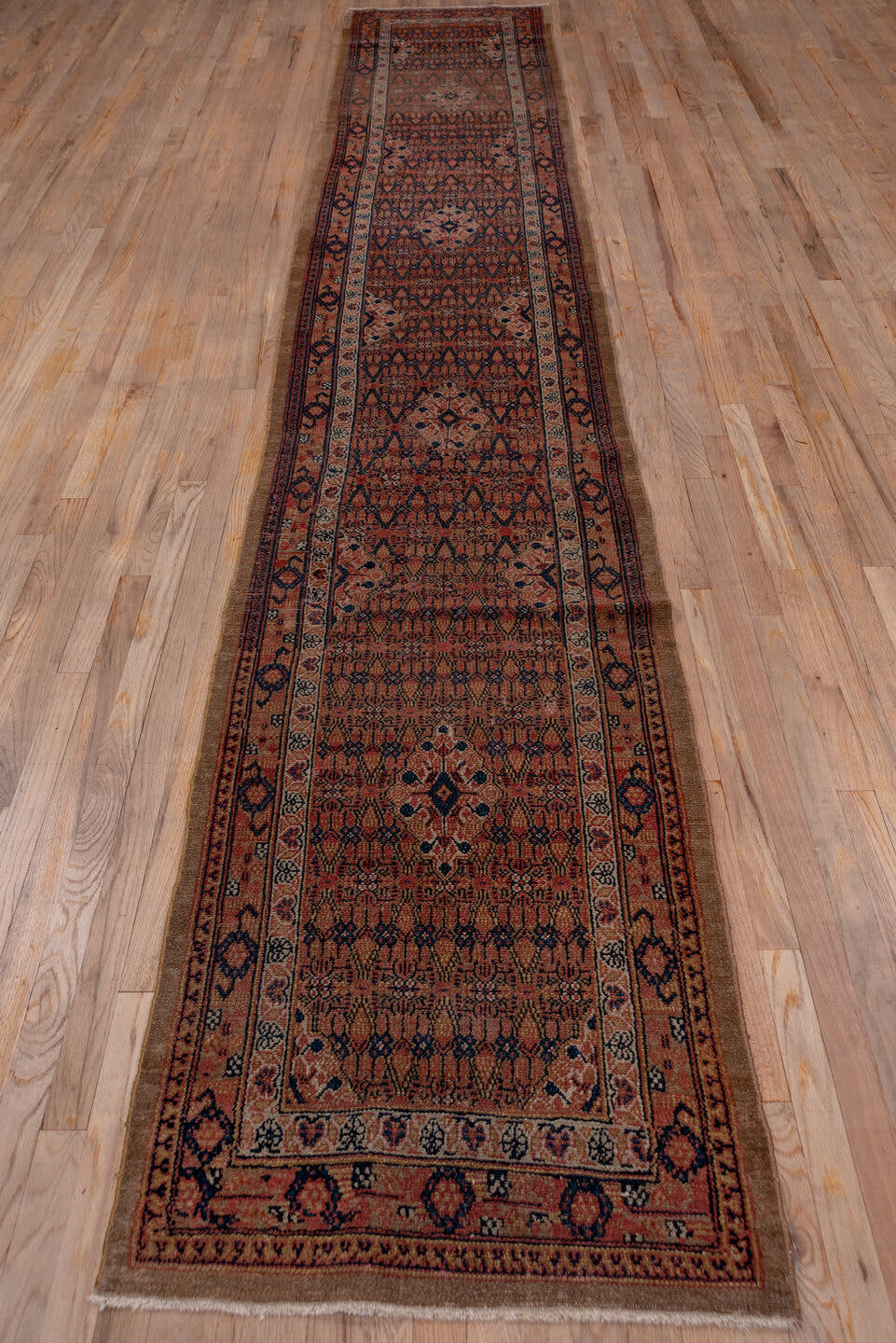 2' x 15' one-of-a-kind handmade antique Cam Hamadan runner rug. Color palette: terra cotta, navy, camel, rust, ivory, brown