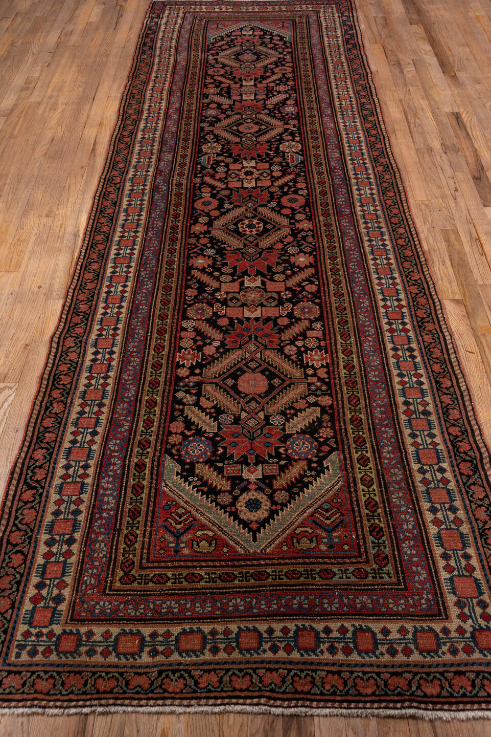 3' x 12' one-of-a-kind handmade vintage Malayer runner rug. Color palette: brown, gray, pink, red