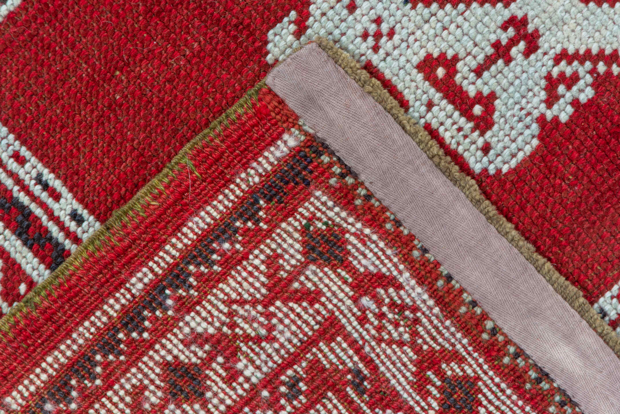 3' x 11' one-of-a-kind handmade vintage Tulu runner rug. Color palette: terracotta, ivory, crimson, charcoal, brown, red