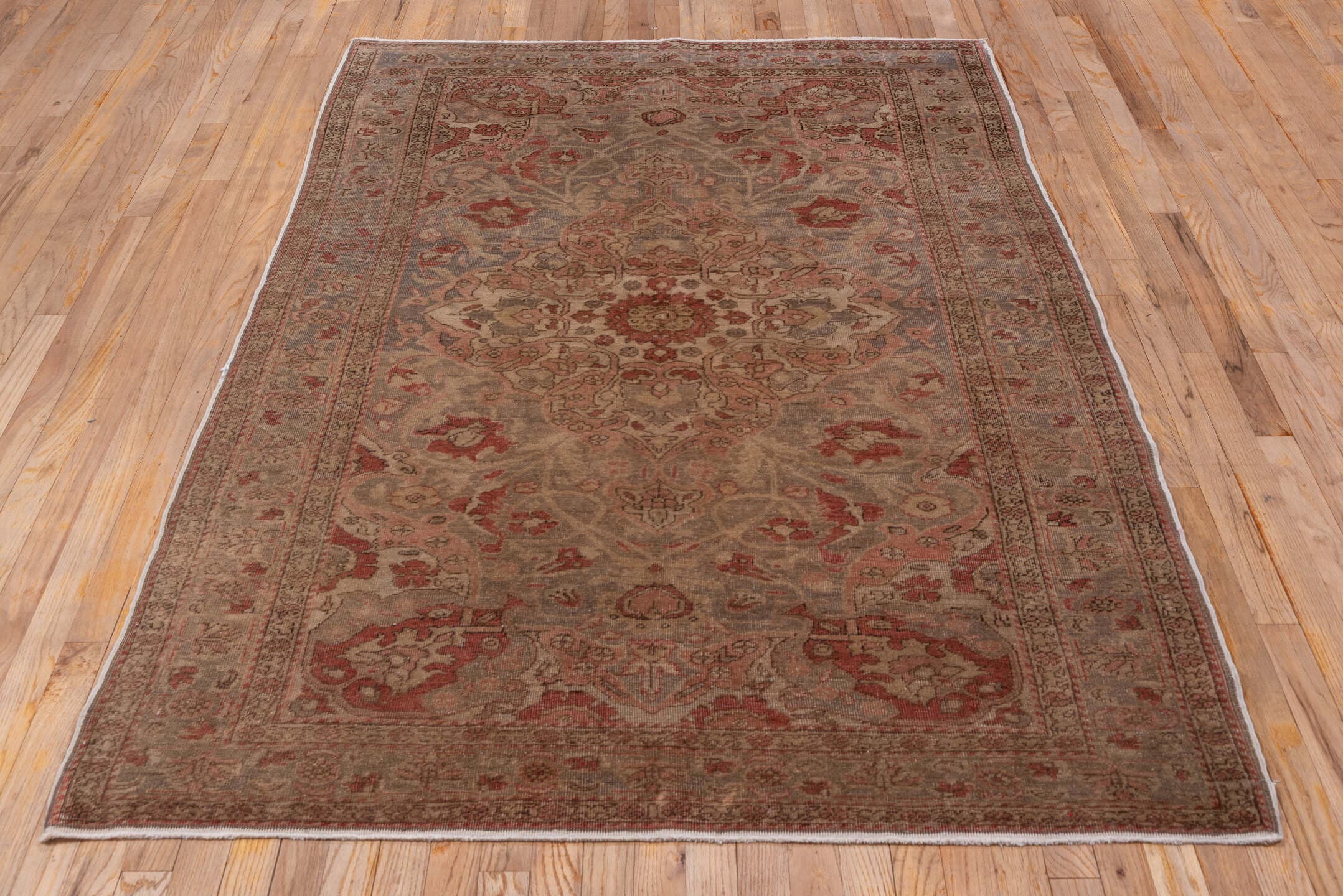 4' x 7' one-of-a-kind handmade antique Oushak rug. Color palette: taupe, rose, rust, ivory, terra cotta, beige, sage, gray