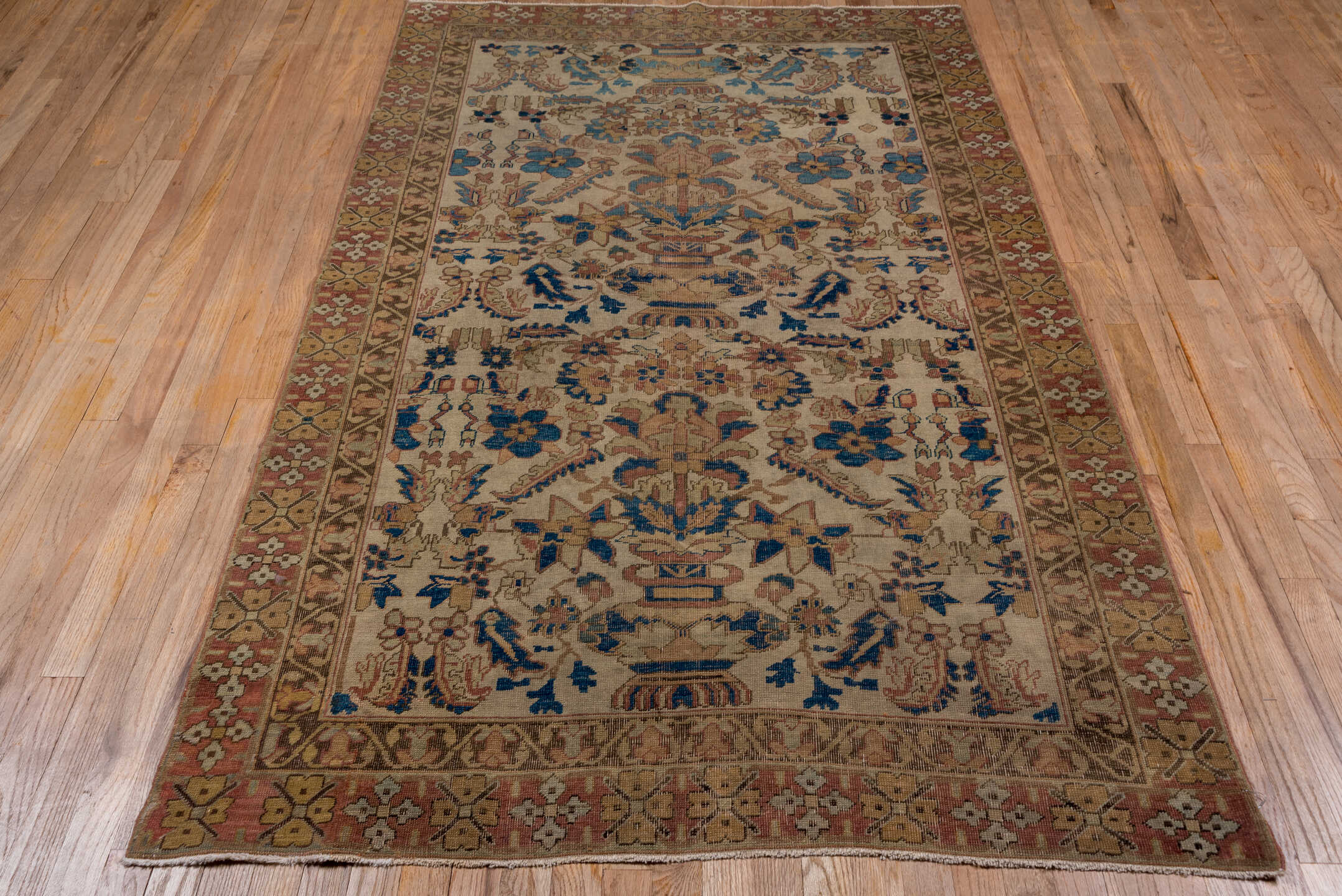 4' x 7' one-of-a-kind handmade antique Afshar rug. Color palette: ivory, rust, gold, cobalt, taupe, rose, camel, olive
