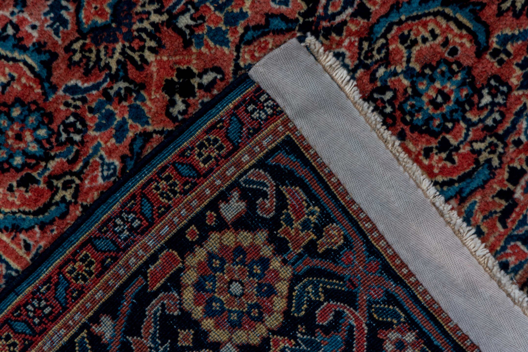 7' x 16' one-of-a-kind handmade antique Karabagh rug. Color palette: rose, navy, terracotta, dusty blue, ivory, rust, slate