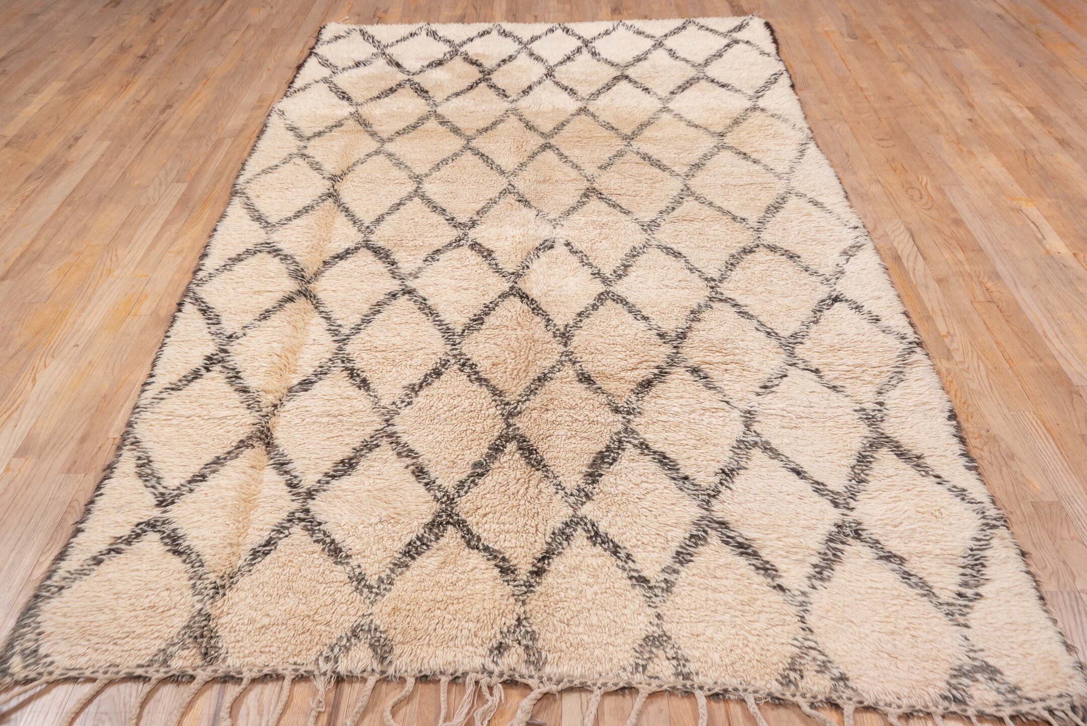 6' x 11' one-of-a-kind handmade antique Moroccan large size rug. Color palette: ivory, charcoal, cream, taupe, gray, black