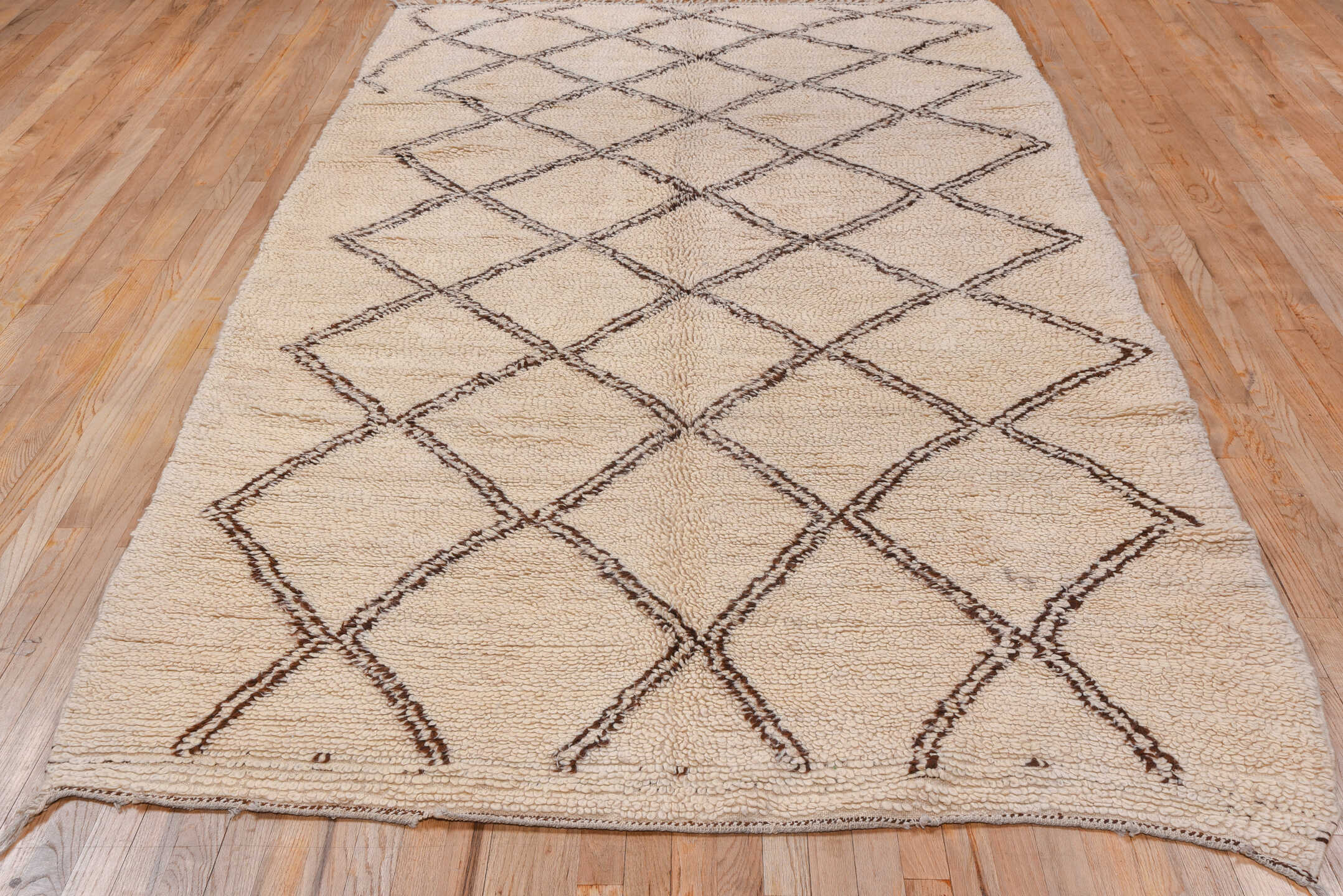6' x 10' one-of-a-kind handmade antique Moroccan large size rug. Color palette: ivory, brown, camel, beige