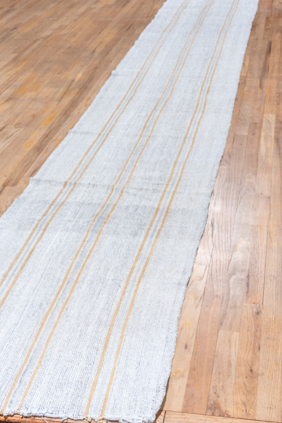 2' x 17' one-of-a-kind handmade antique Flatweave runner rug. Color palette: ivory, cream, saffron, beige, gold, terracotta