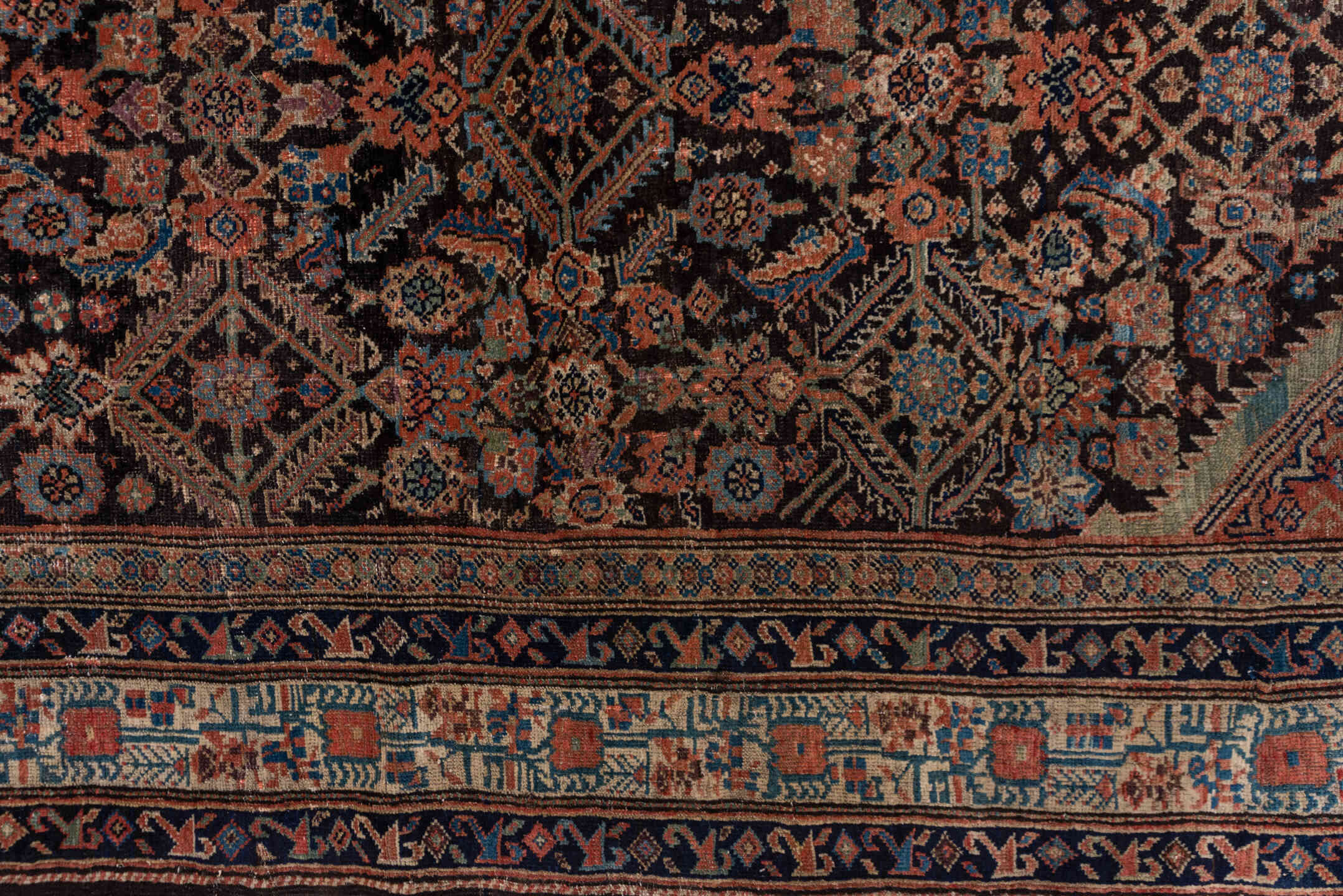 3' x 12' one-of-a-kind handmade vintage Tulu runner rug. Color palette: deep brown, terracotta, ivory, muted blue, navy