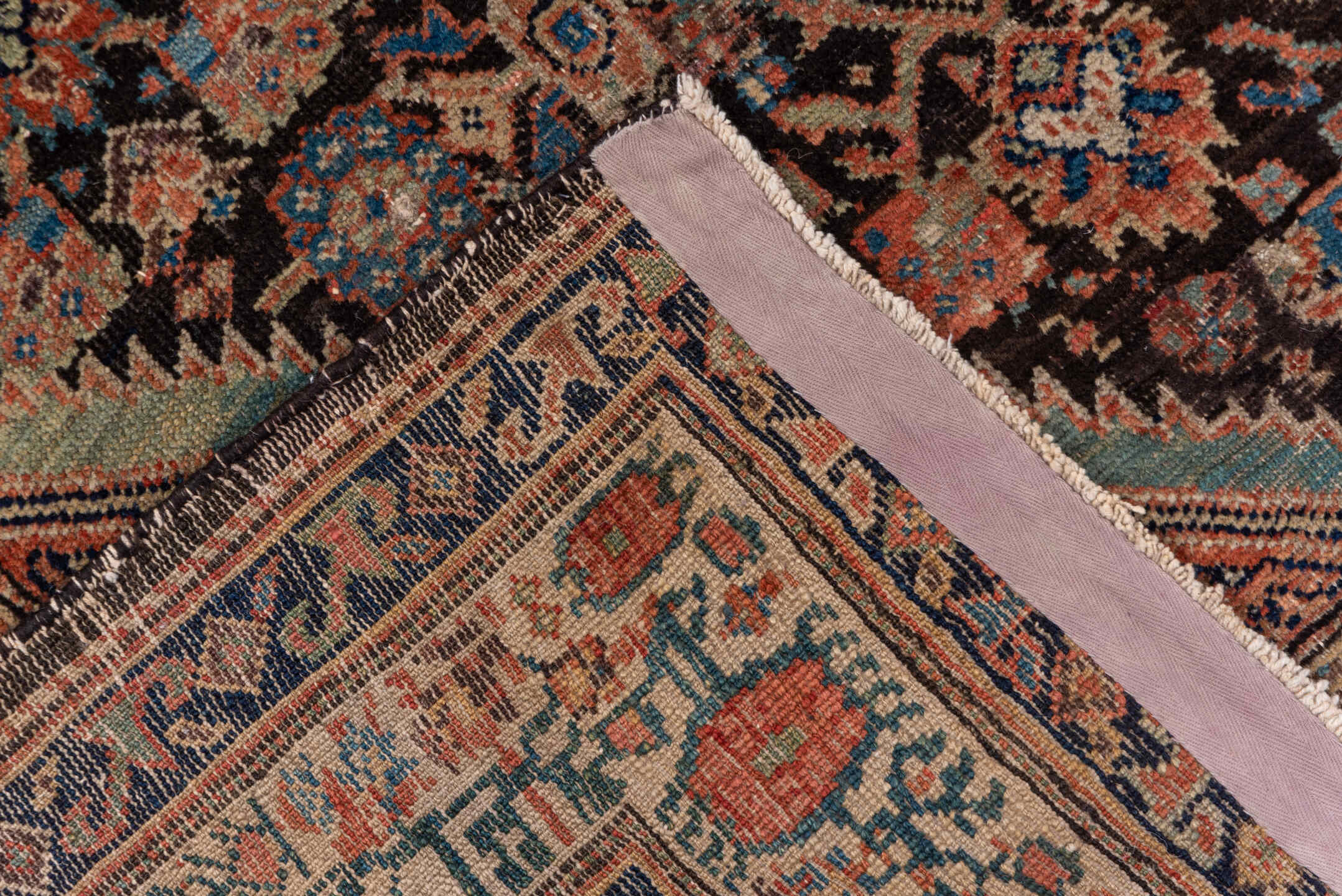 3' x 12' one-of-a-kind handmade vintage Tulu runner rug. Color palette: deep brown, terracotta, ivory, muted blue, navy