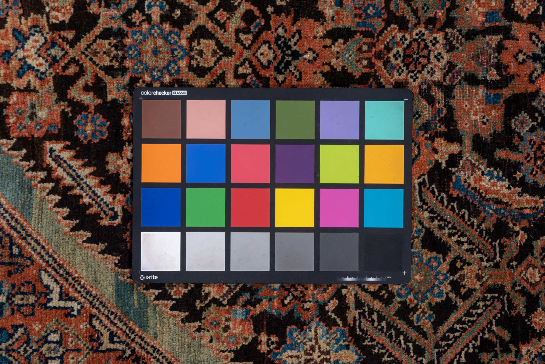 3' x 12' one-of-a-kind handmade vintage Tulu runner rug. Color palette: deep brown, terracotta, ivory, muted blue, navy