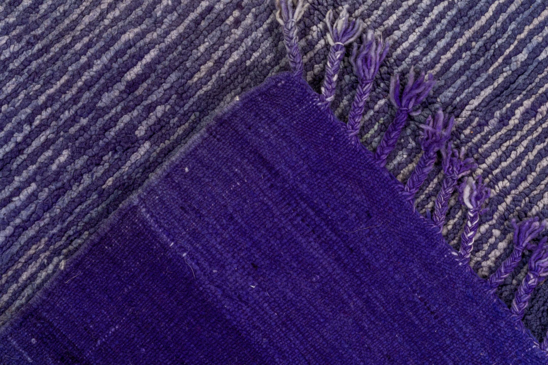5' x 8' one-of-a-kind handmade vintage Moroccan medium size rug. Color palette: violet, indigo, lavender, charcoal, pink