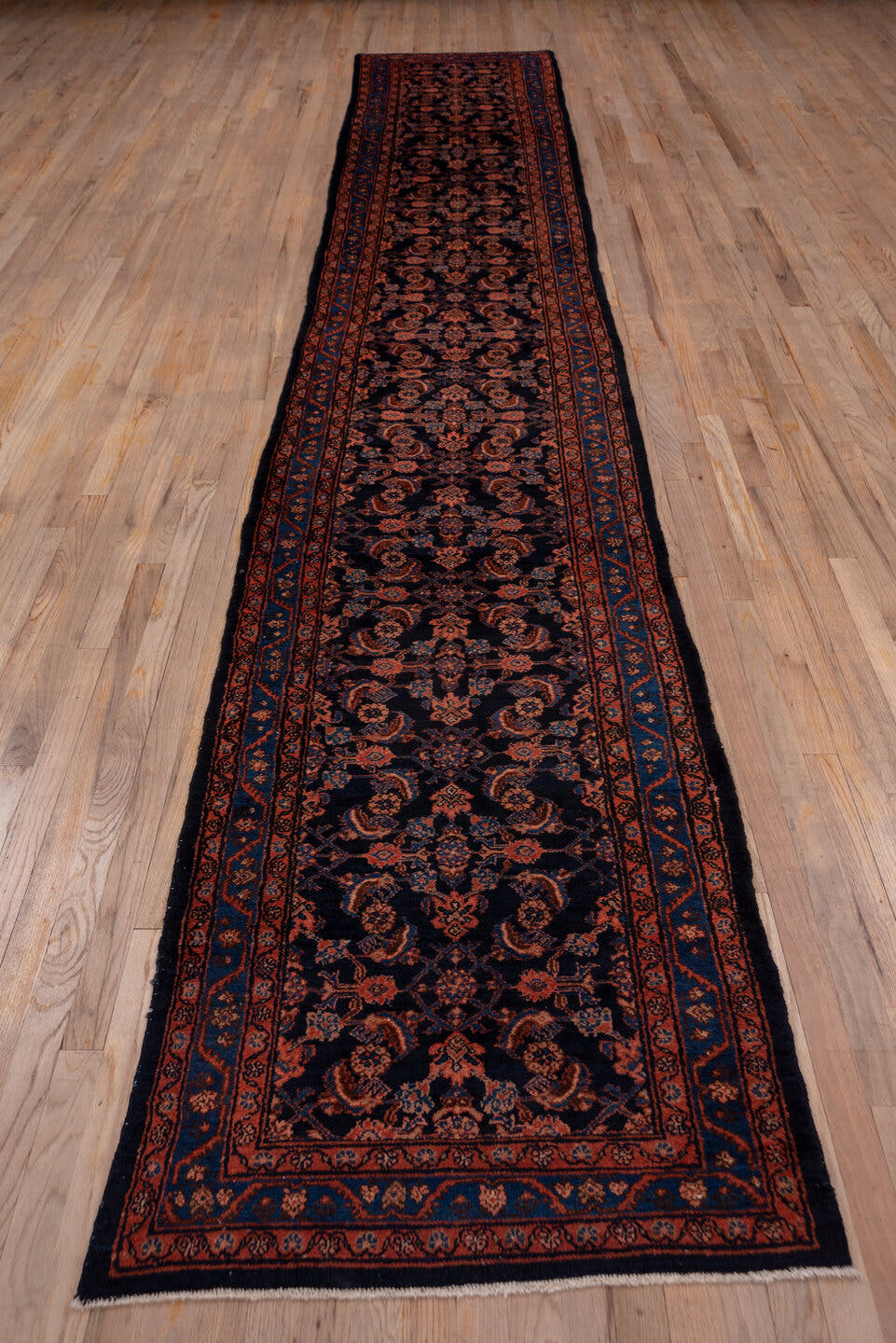 9' x 11' one-of-a-kind handmade vintage Afghan large size rug. Color palette: navy, rust, terra cotta, indigo, camel, blue