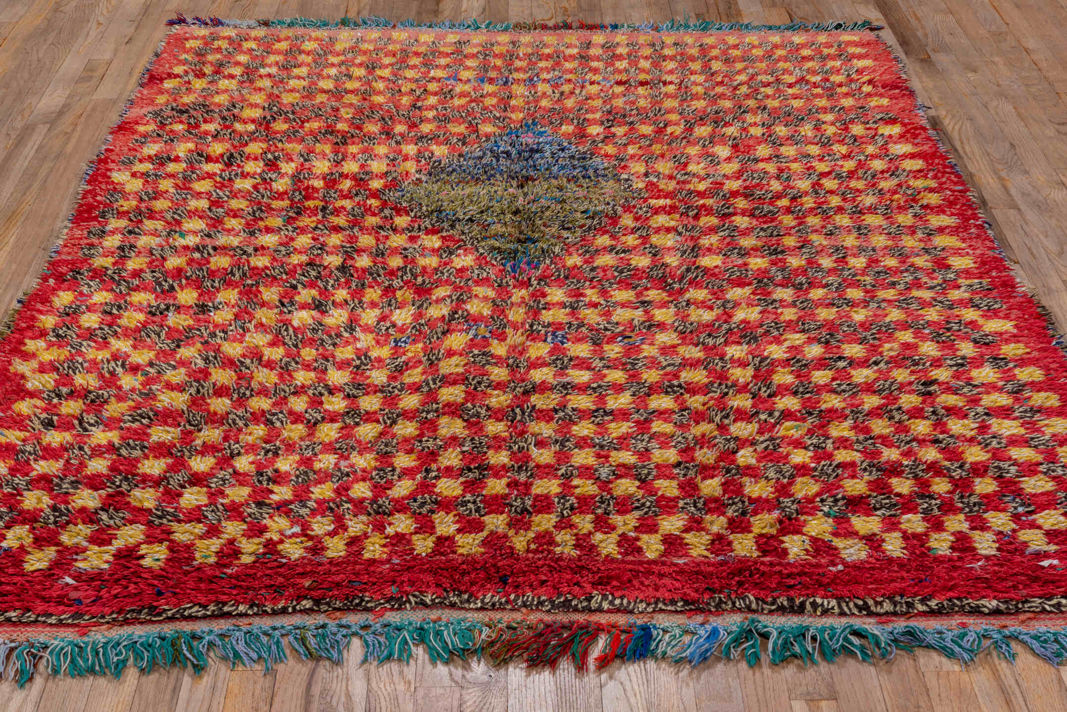 5' x 7' one-of-a-kind handmade vintage Rag Rug rug. Color palette: red, gold, dark brown, rust, blue, teal, ivory, brown