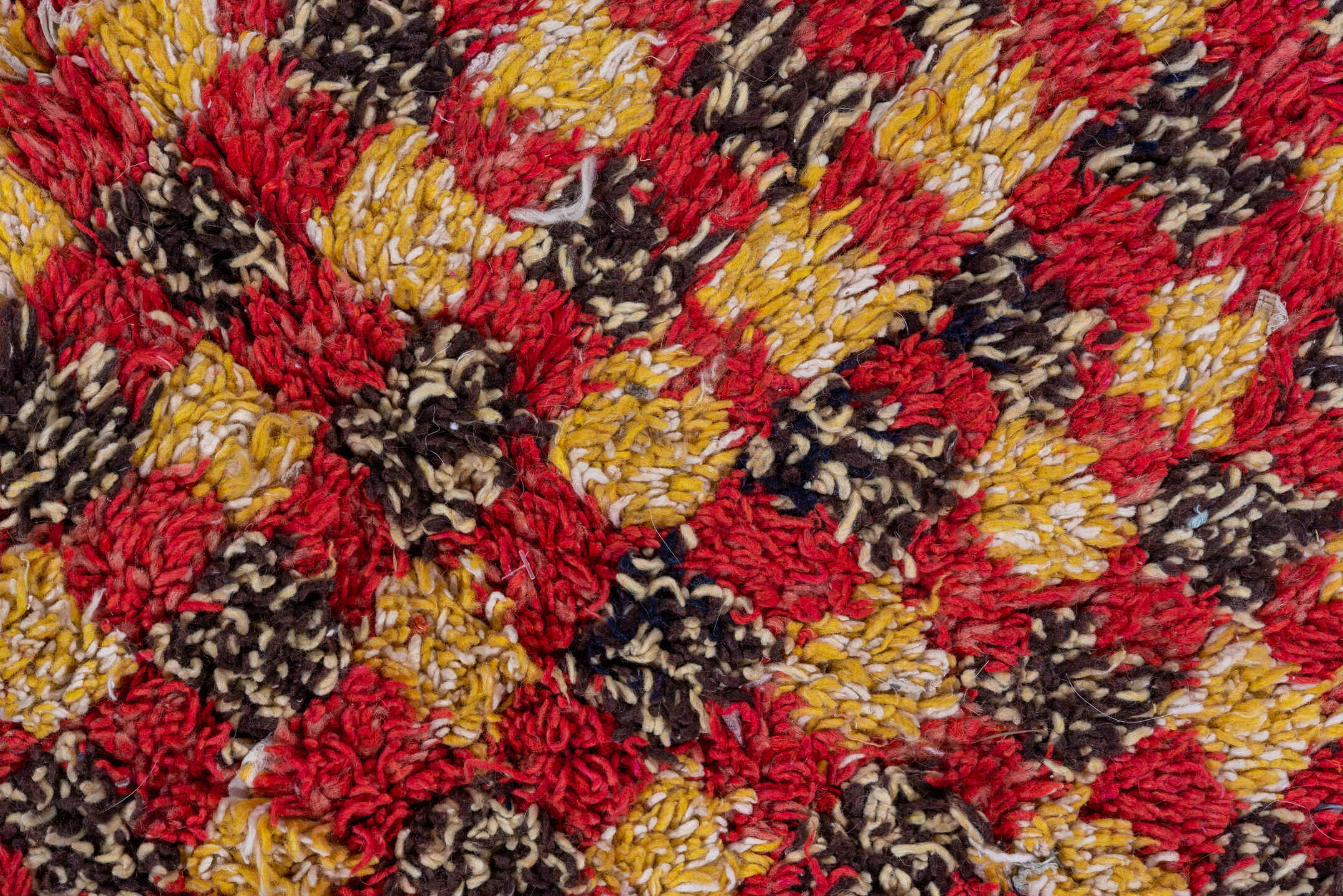 5' x 7' one-of-a-kind handmade vintage Rag Rug rug. Color palette: red, gold, dark brown, rust, blue, teal, ivory, brown