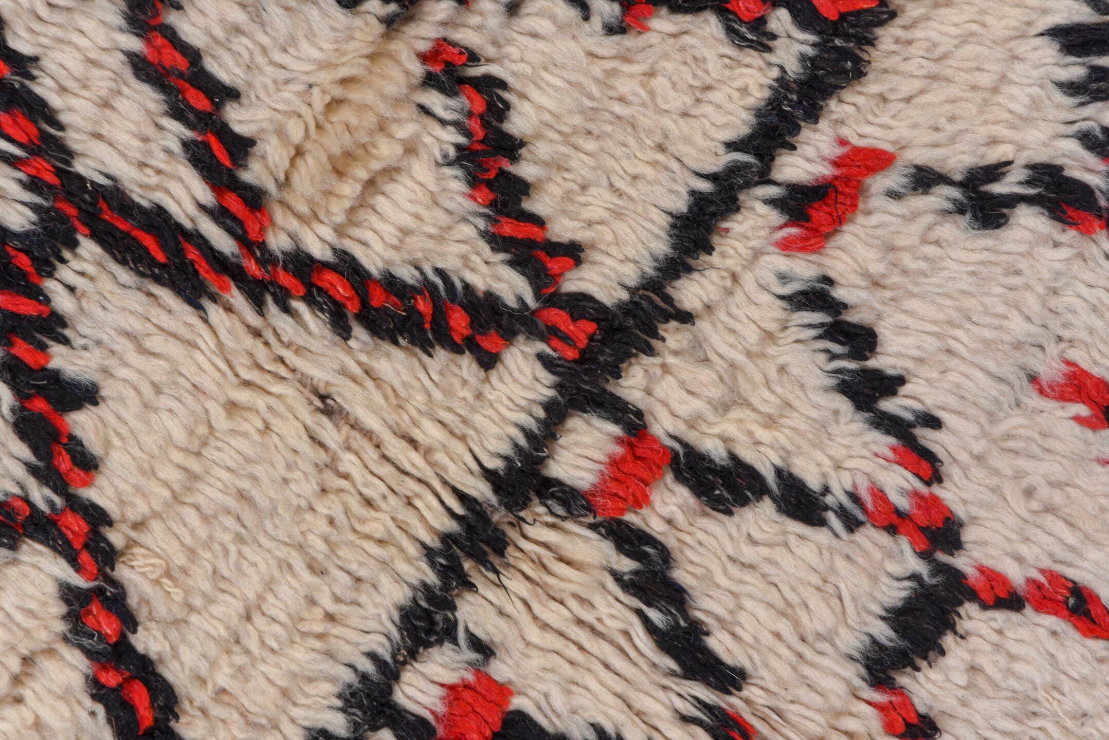 5' x 11' one-of-a-kind handmade vintage Moroccan rug. Color palette: ivory, black, red, coral, gold, blue, green, terracotta