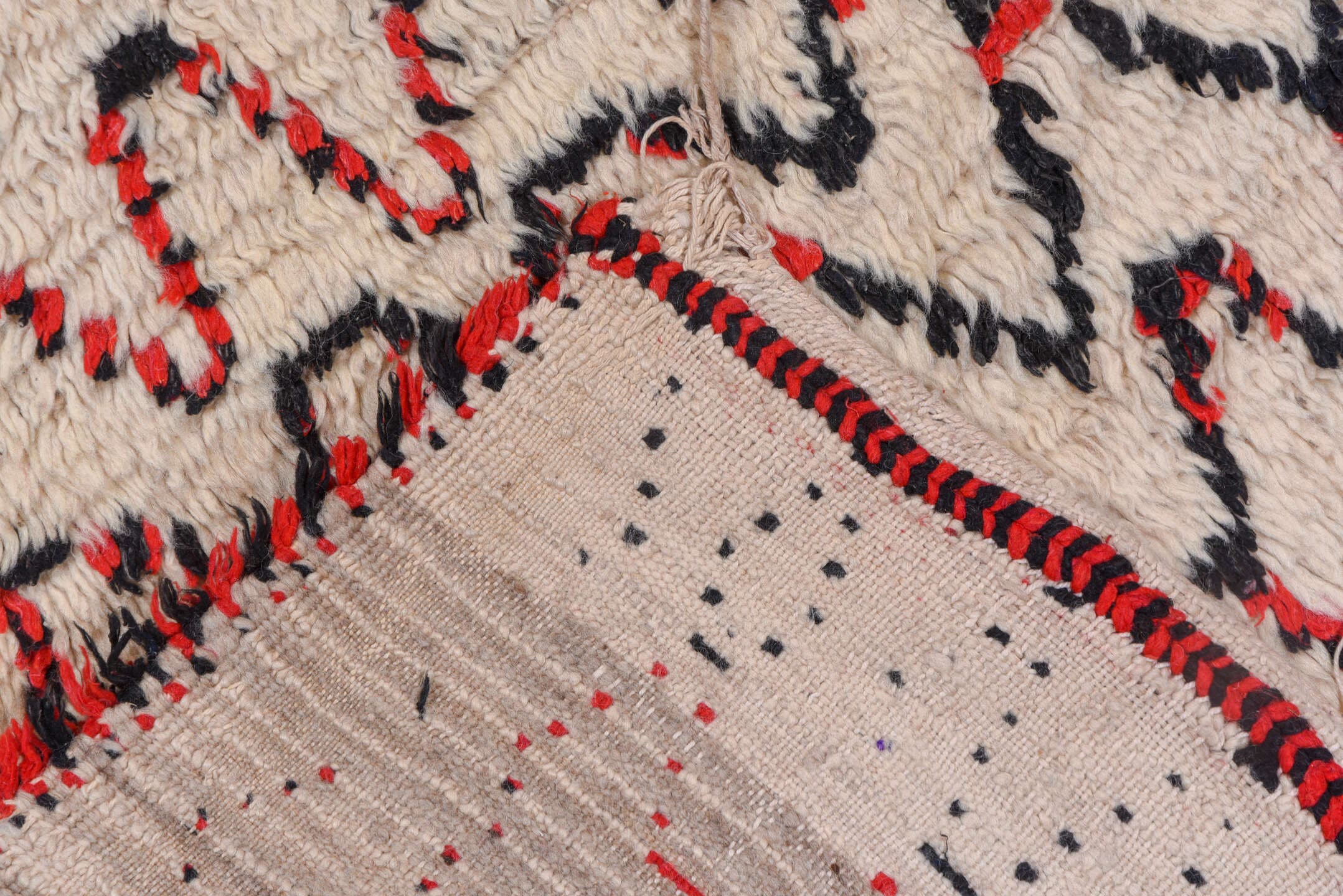 5' x 11' one-of-a-kind handmade vintage Moroccan rug. Color palette: ivory, black, red, coral, gold, blue, green, terracotta
