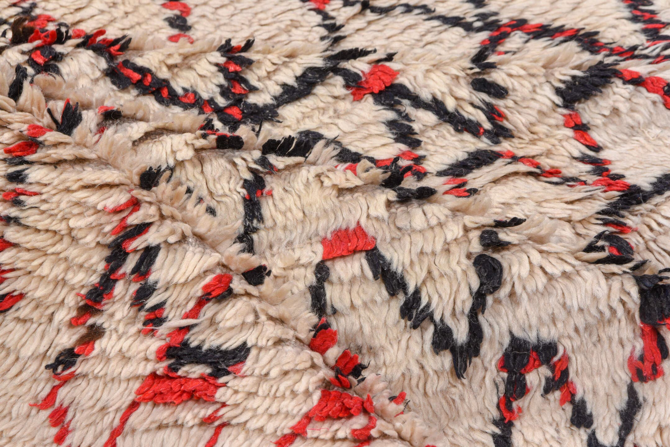 5' x 11' one-of-a-kind handmade vintage Moroccan rug. Color palette: ivory, black, red, coral, gold, blue, green, terracotta