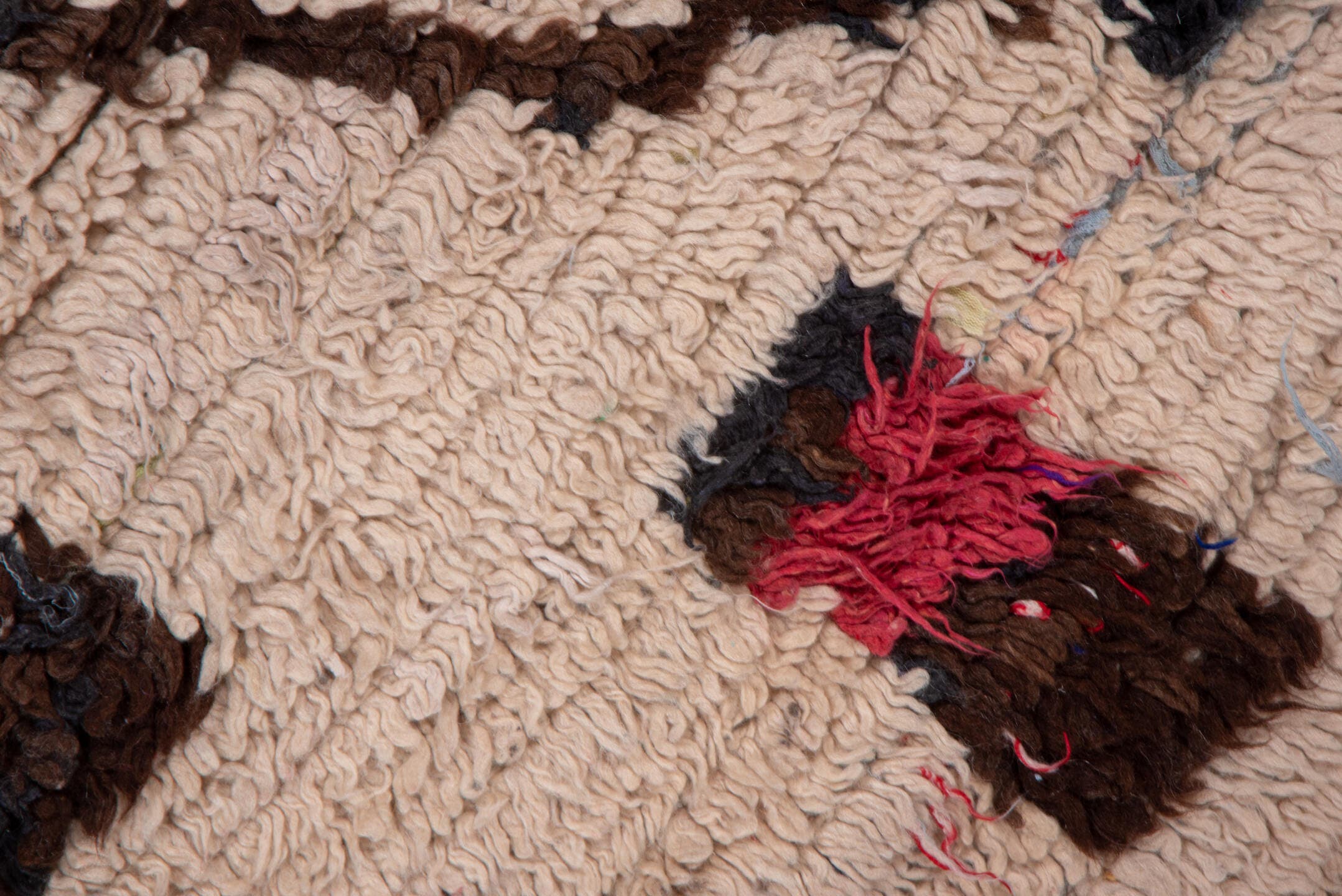 4' x 6' one-of-a-kind handmade vintage Moroccan small size rug. Color palette: ivory, brown, crimson, cobalt, teal, rose