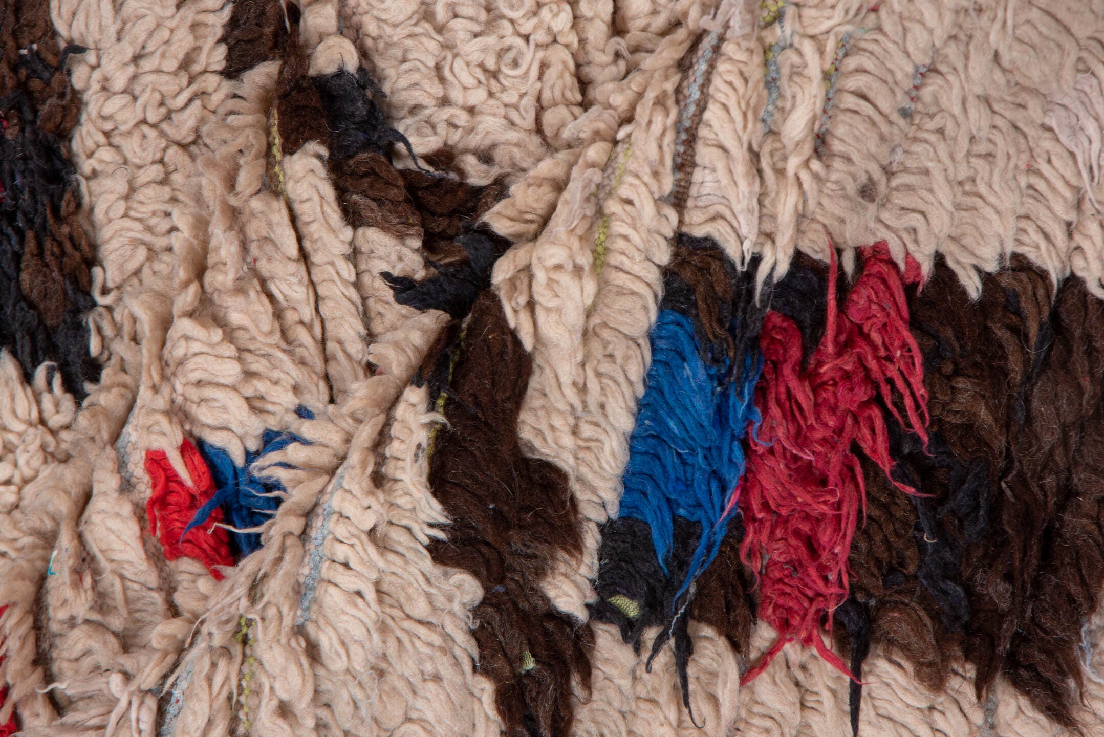 4' x 6' one-of-a-kind handmade vintage Moroccan small size rug. Color palette: ivory, brown, crimson, cobalt, teal, rose